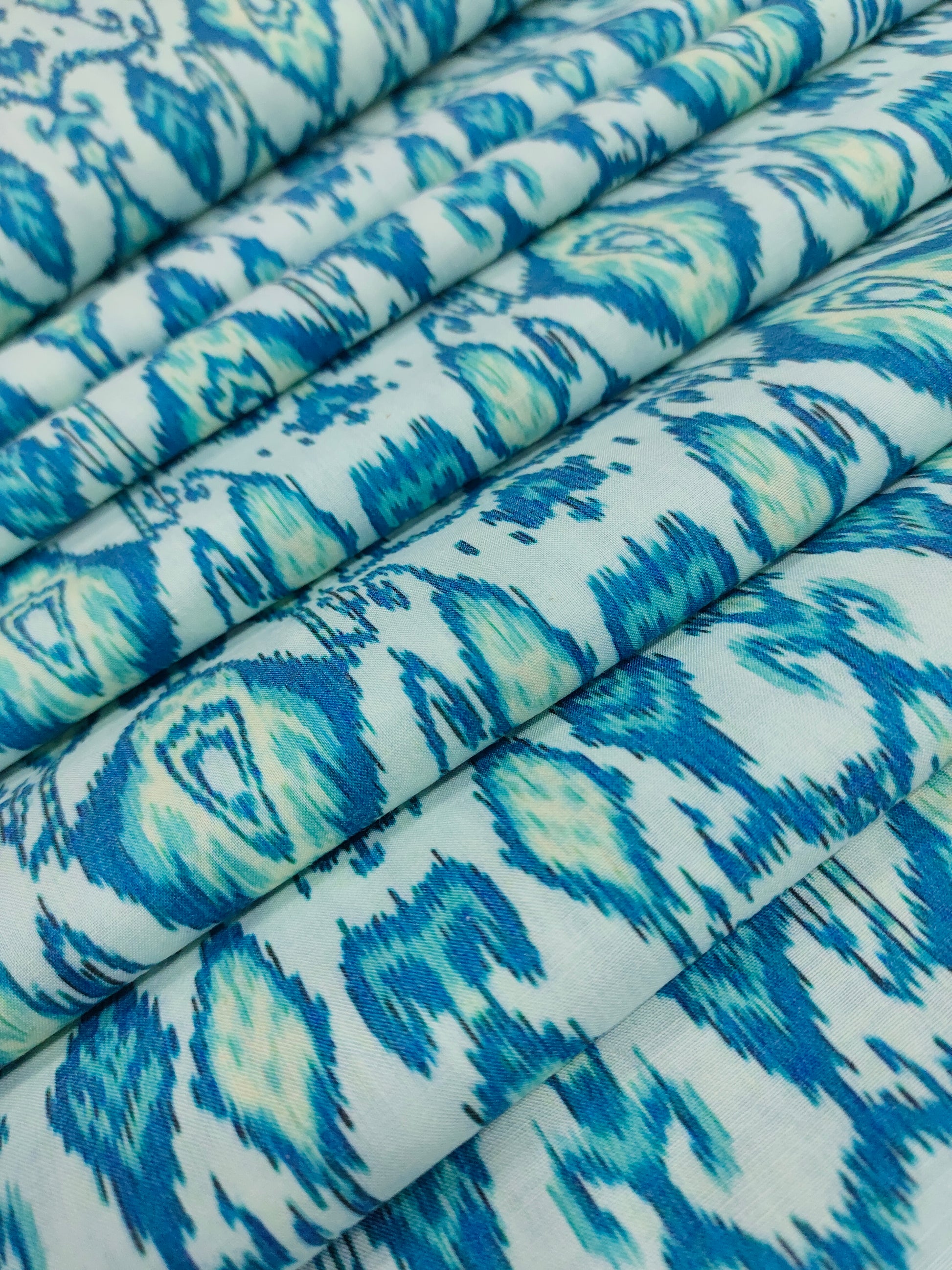 Cotton digital print with with 2 shades of blue.