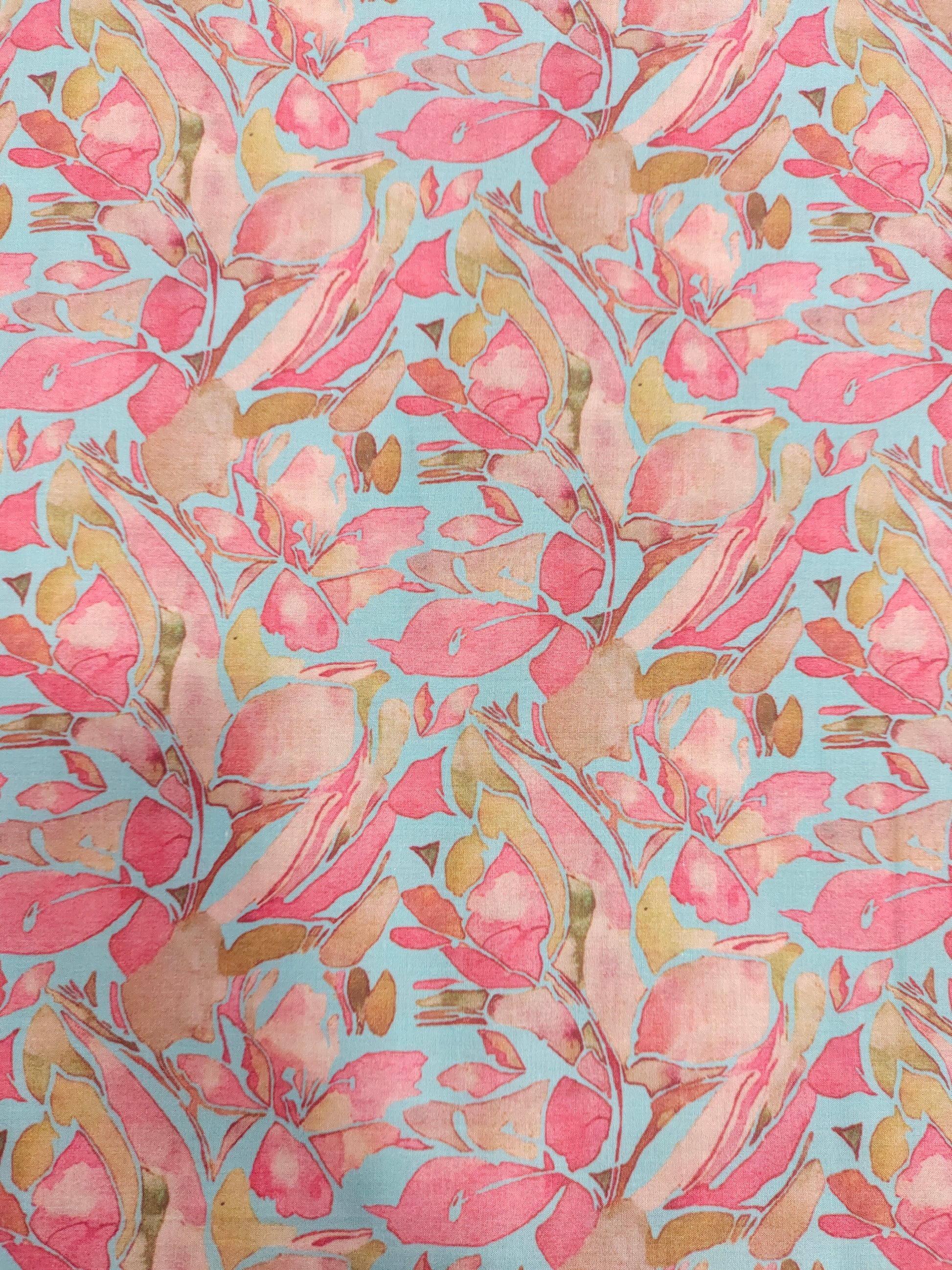 Cotton digital print on blueish green fabric withtomato and peach color.
