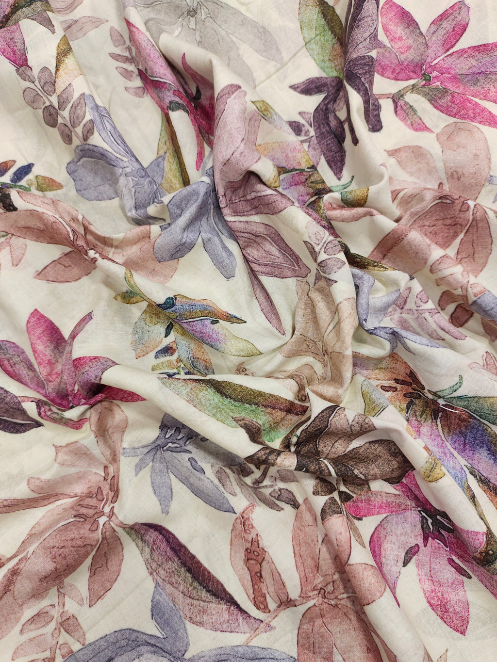 Pure soft cotton fabric digital print with pink and light purple on offwhite base.