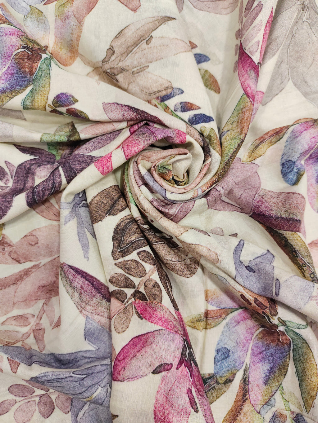 Pure soft cotton fabric digital print with pink and light purple on offwhite base.