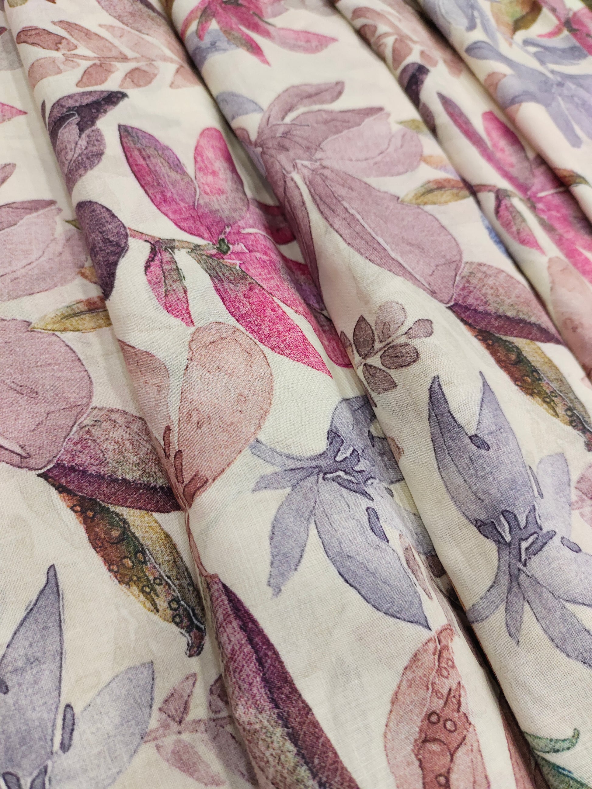 Pure soft cotton fabric digital print with pink and light purple on offwhite base.