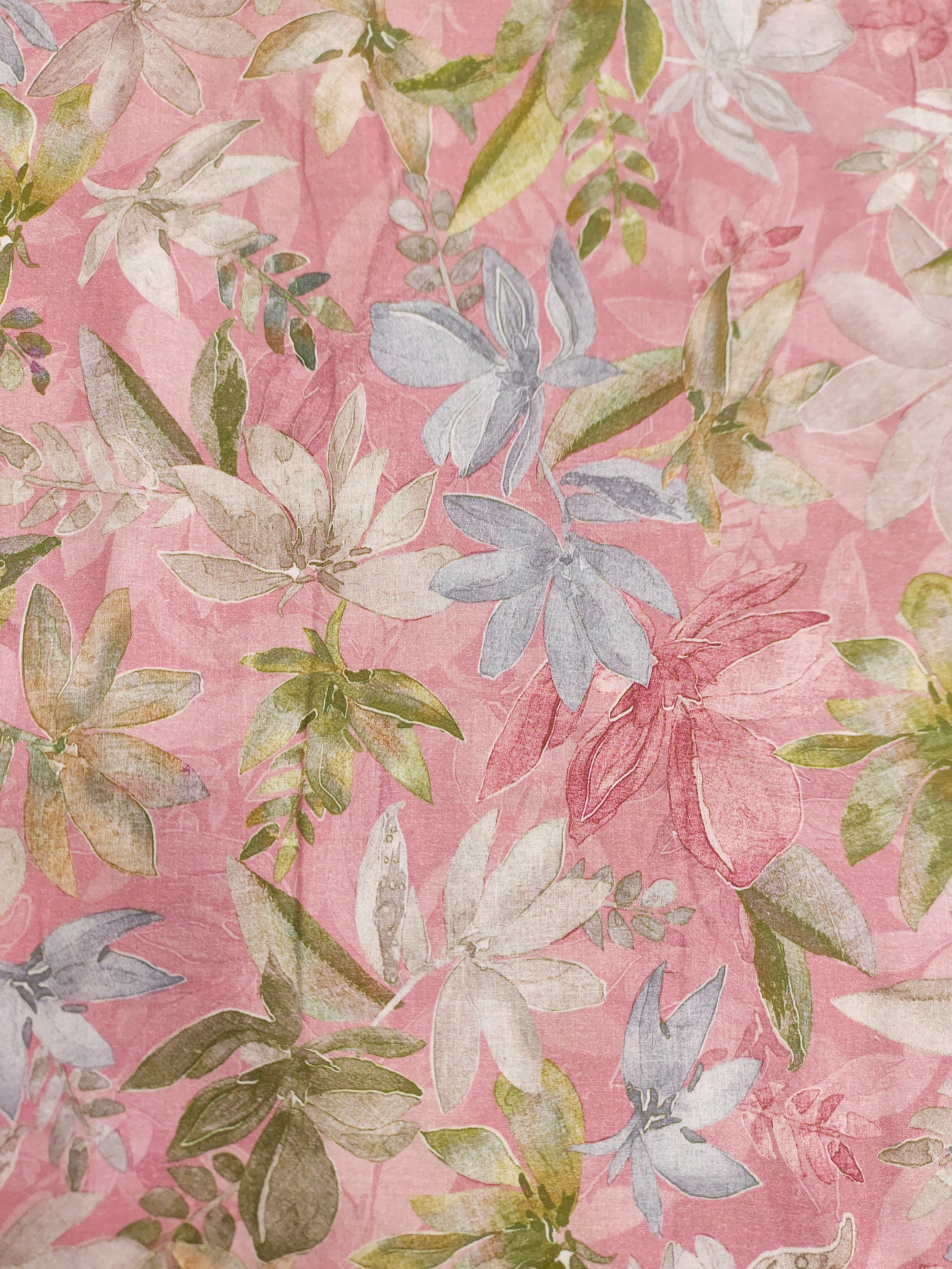 Pastel pink cotton fabric digital print with green sky blue and off white.