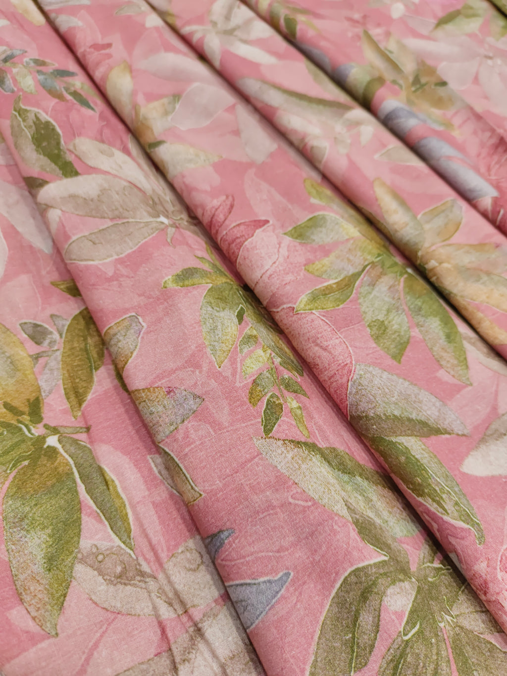 Pastel pink cotton fabric digital print with green sky blue and off white.