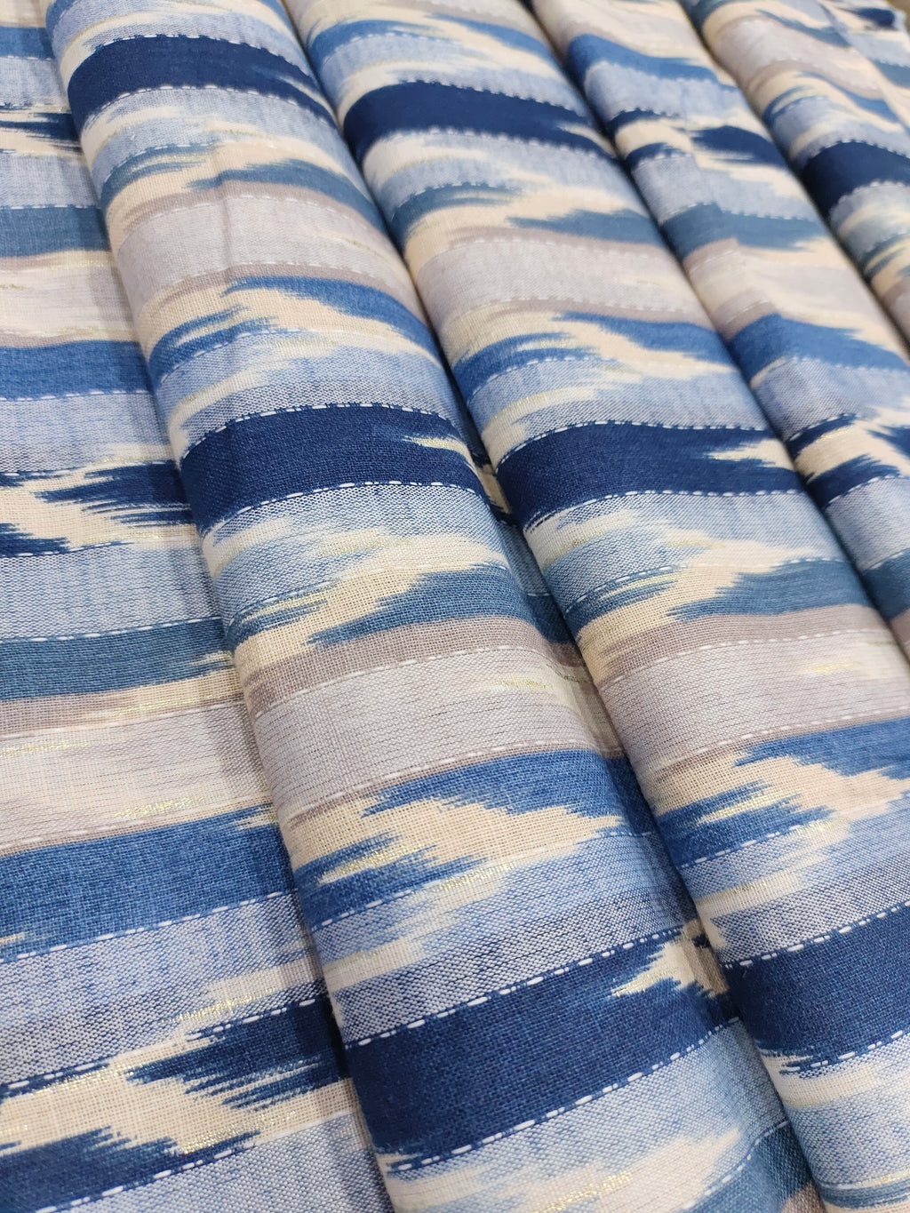 Cotton katha digital print withblu and little gold foile.