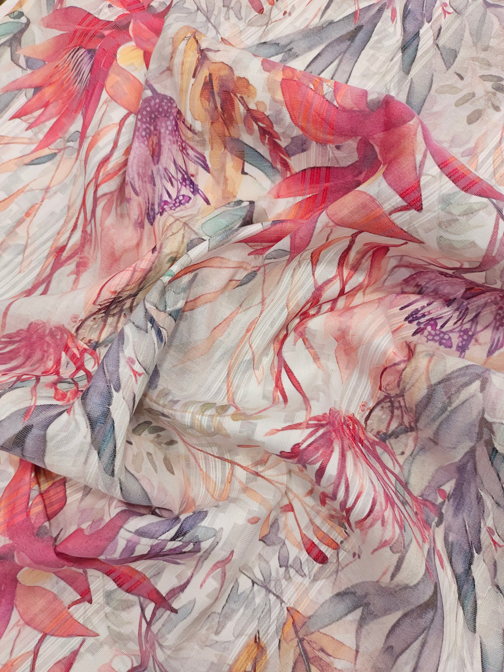 Polycot jacquard digital print with red grey and green.