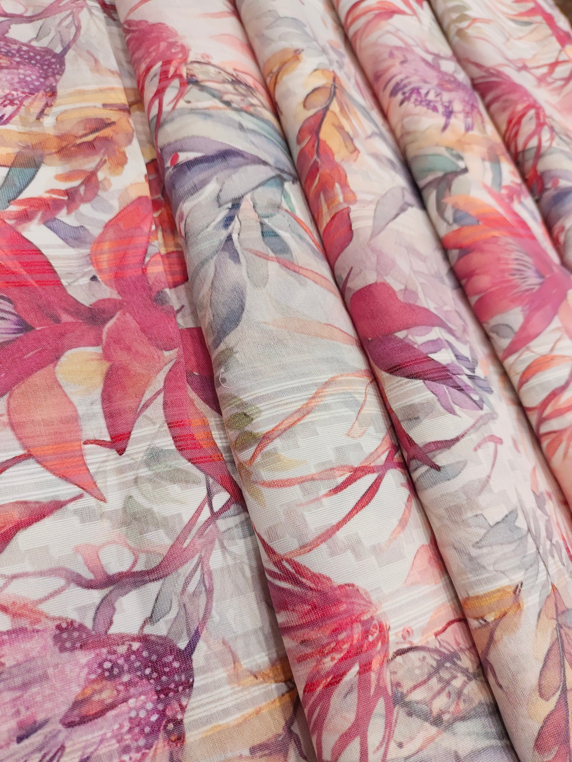 Polycot jacquard digital print with red grey and green.