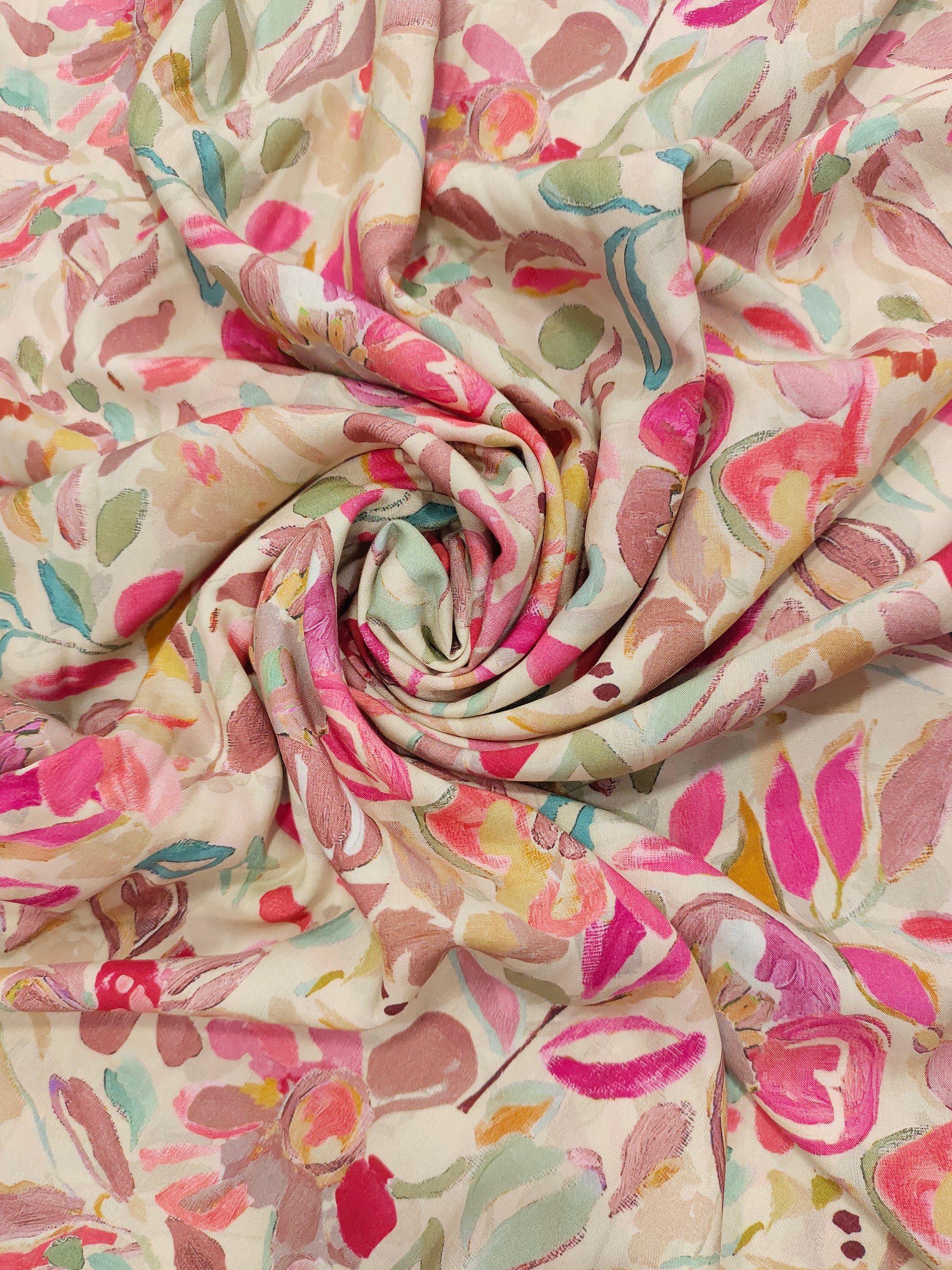 Modal silk digital print with shades of pink and green.