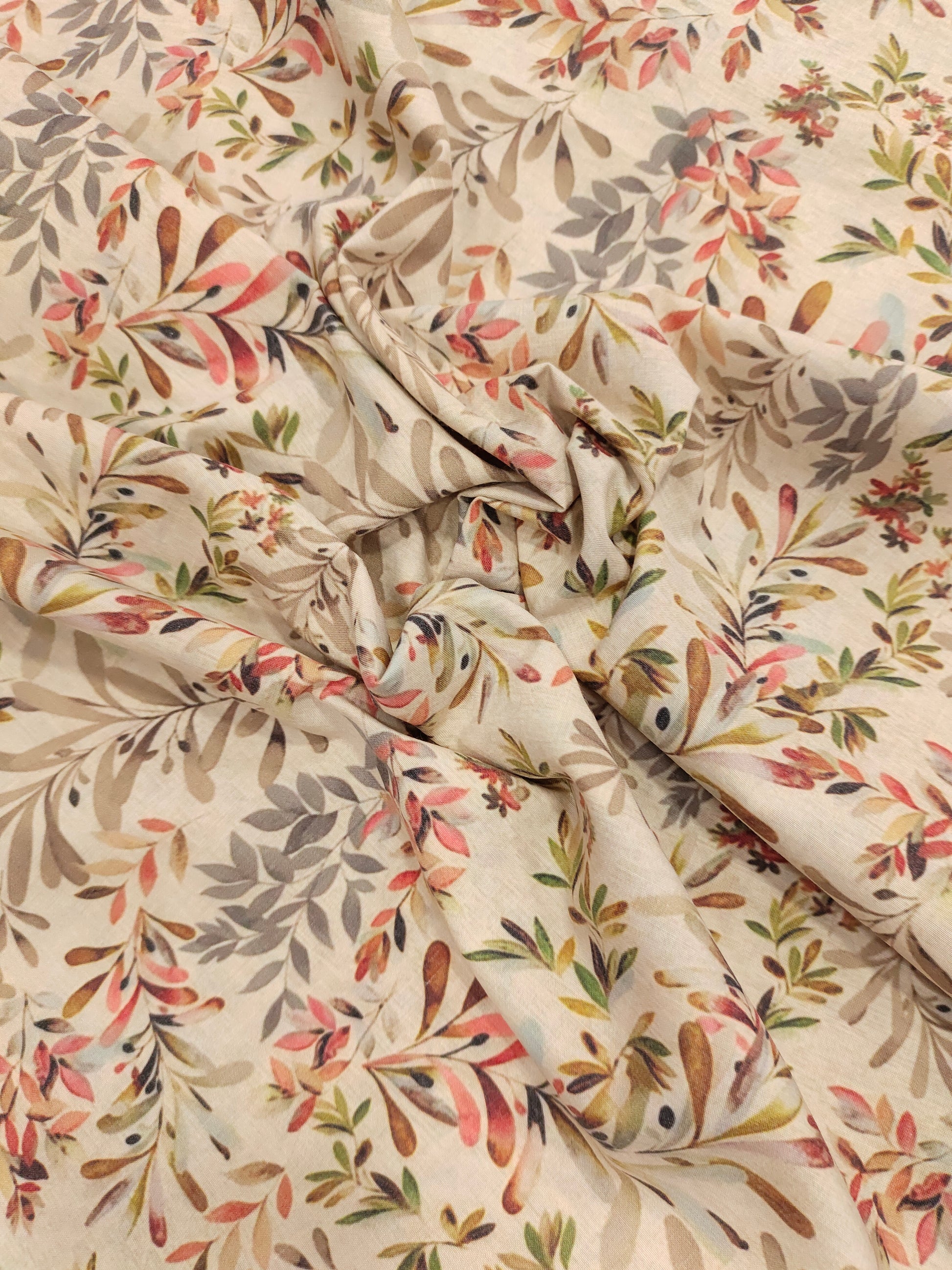 Beige cotton digital print with red light brown and grey.