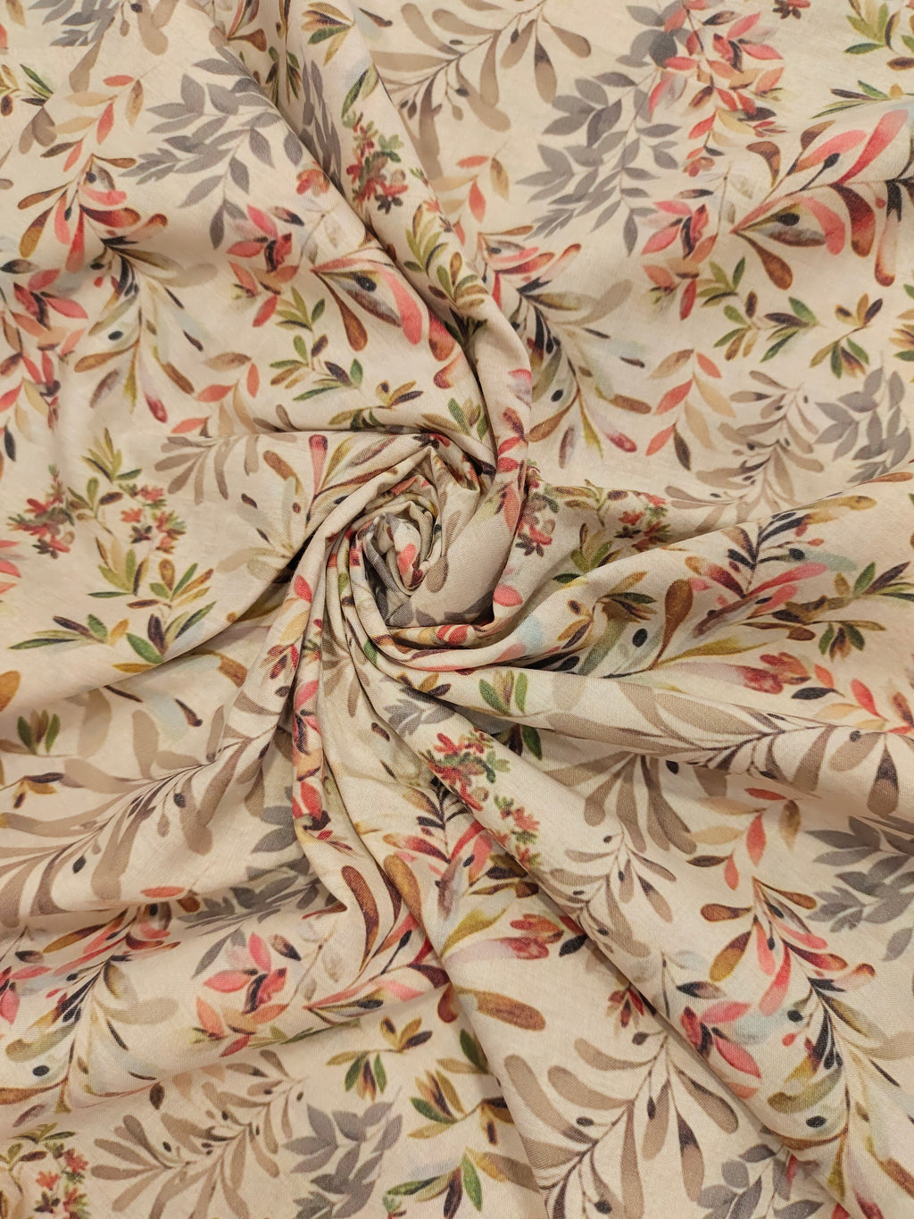 Beige cotton digital print with red light brown and grey.