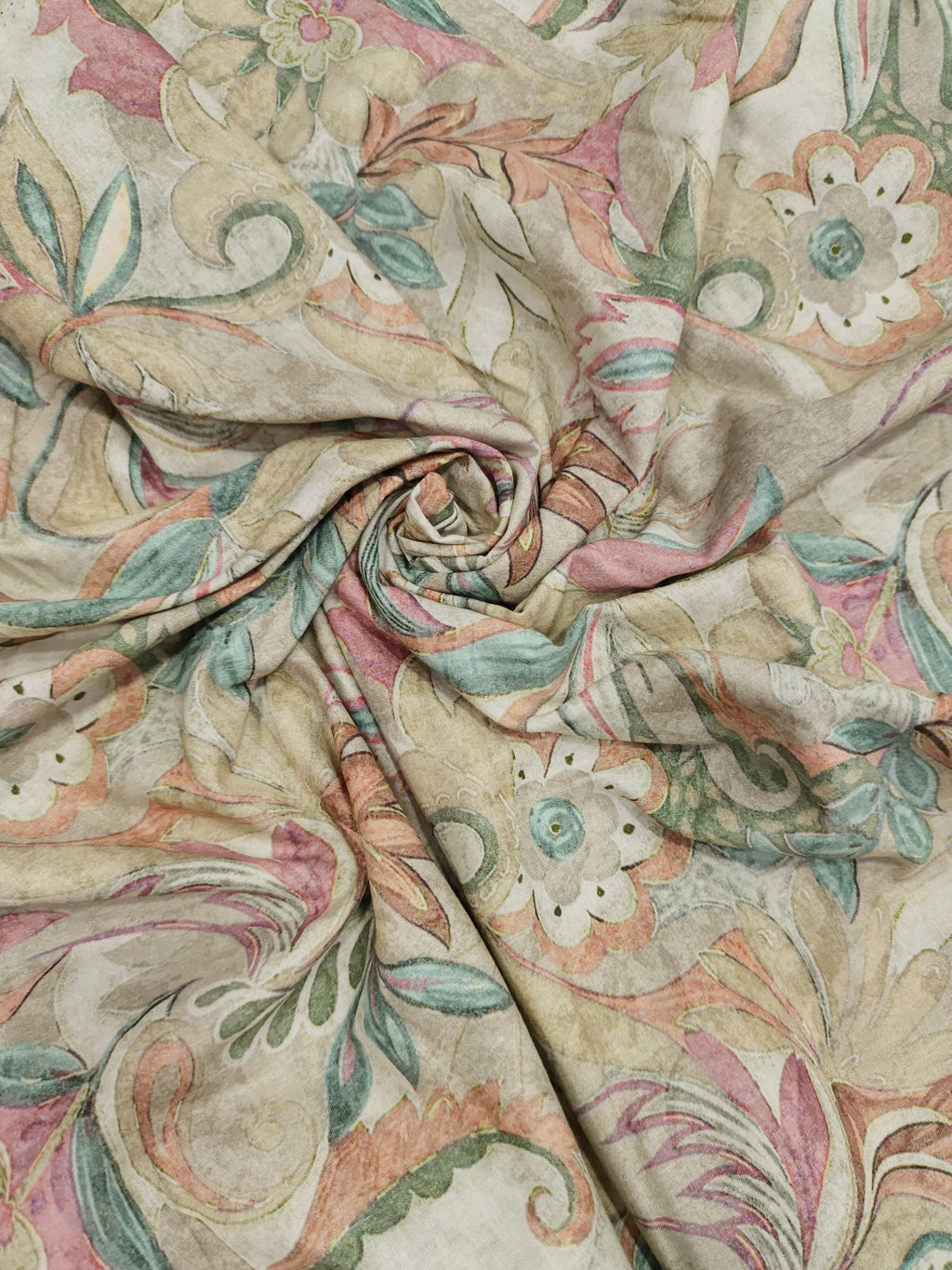 Cotton digital printed fabric with floral colors of pink green and beige.