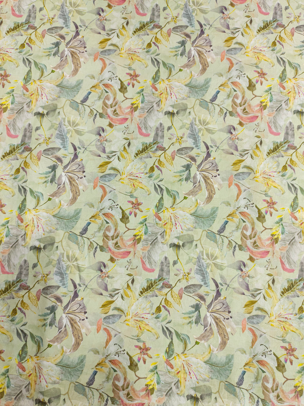 Light pista green pure cotton digital print fabric with yellow green and peach.