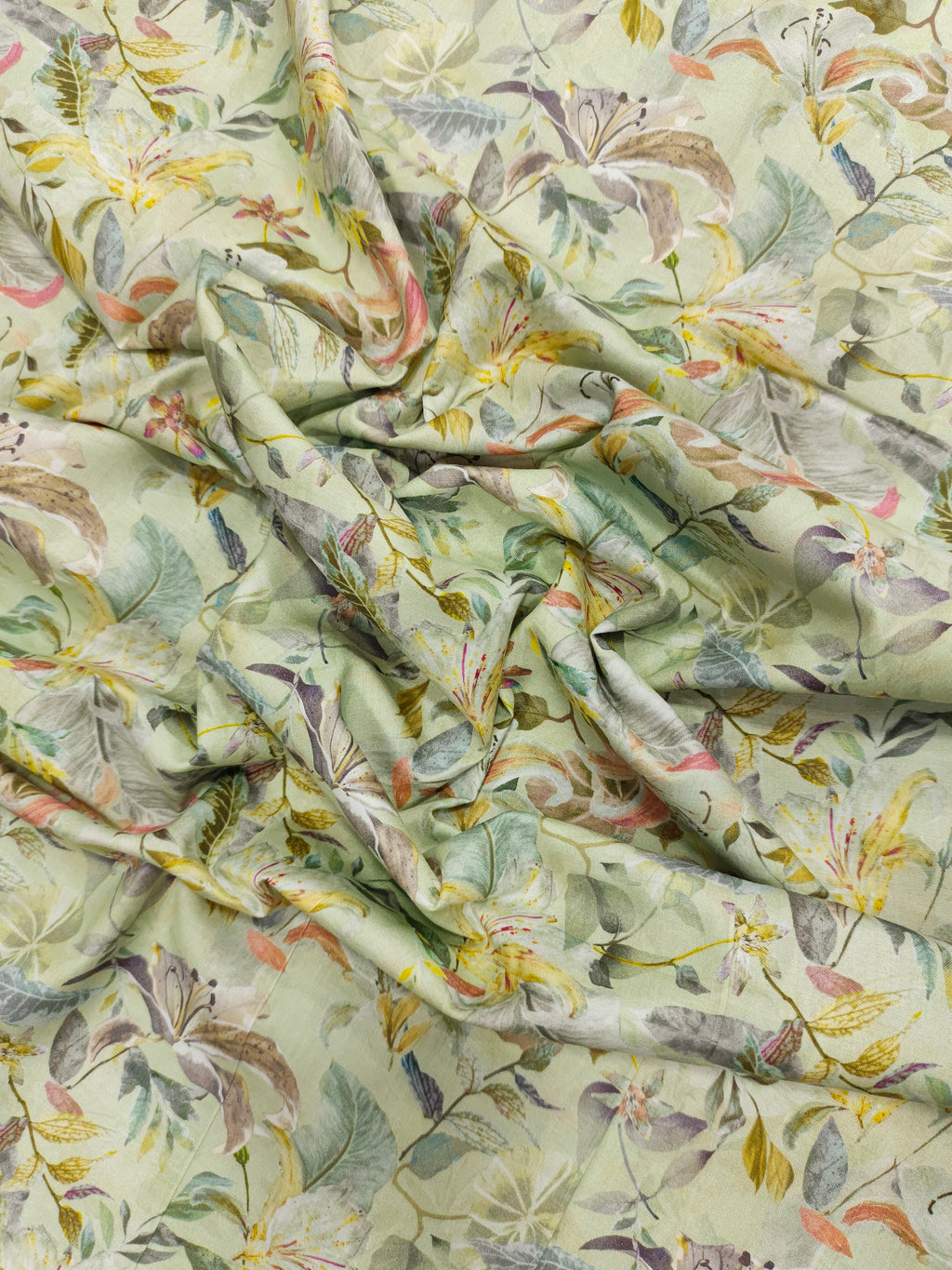 Light pista green pure cotton digital print fabric with yellow green and peach.