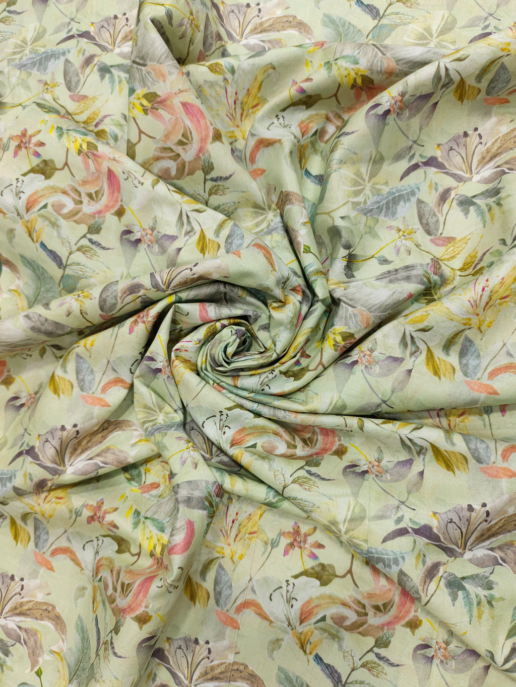 Light pista green pure cotton digital print fabric with yellow green and peach.