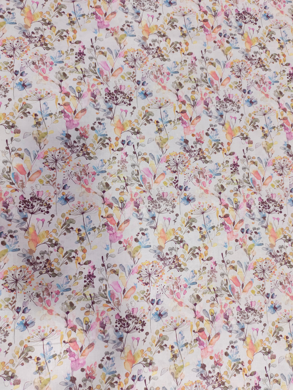 Cotton digital small all over print with pink blue and mauve.