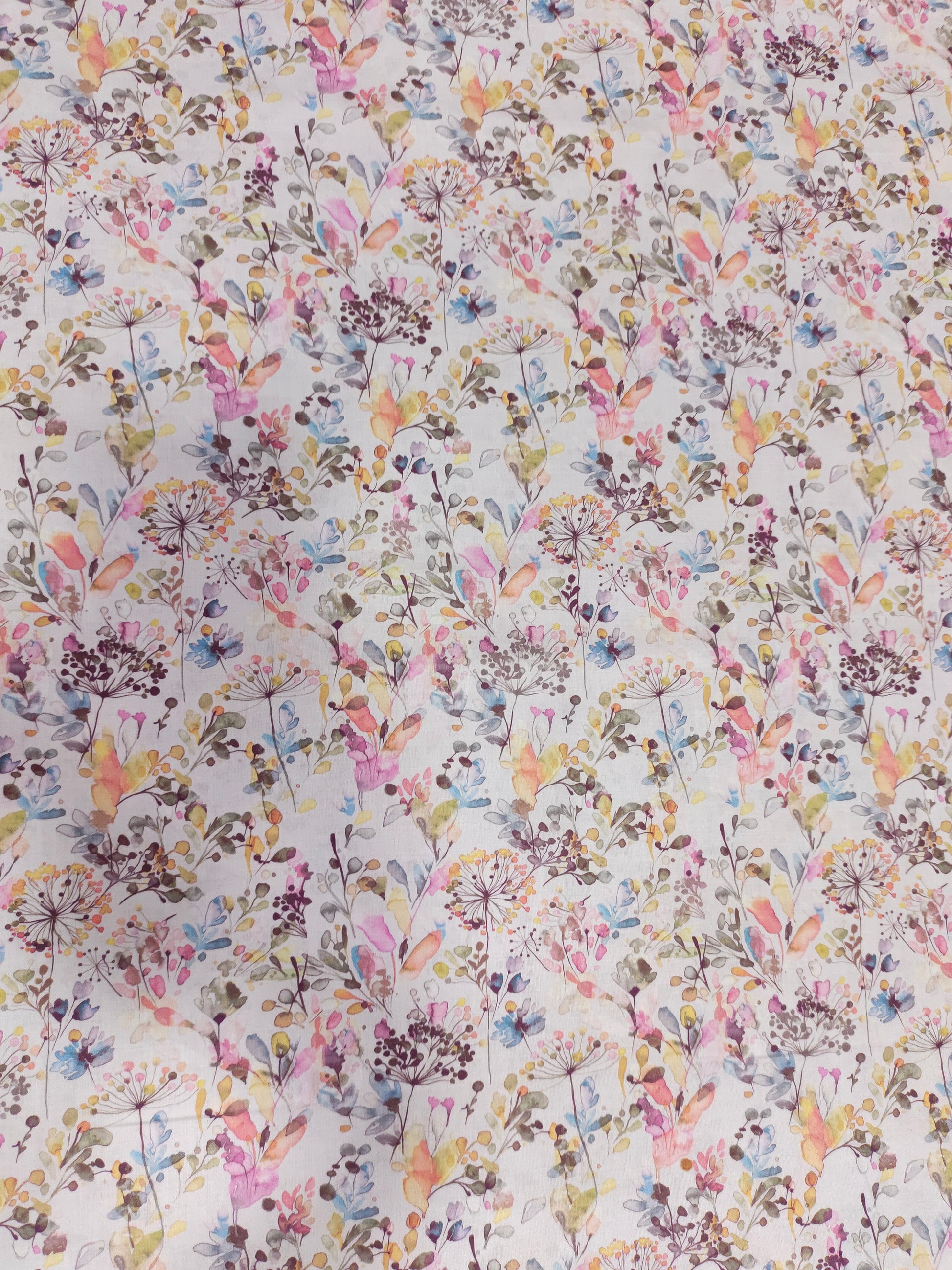 Cotton digital small all over print with pink blue and mauve.