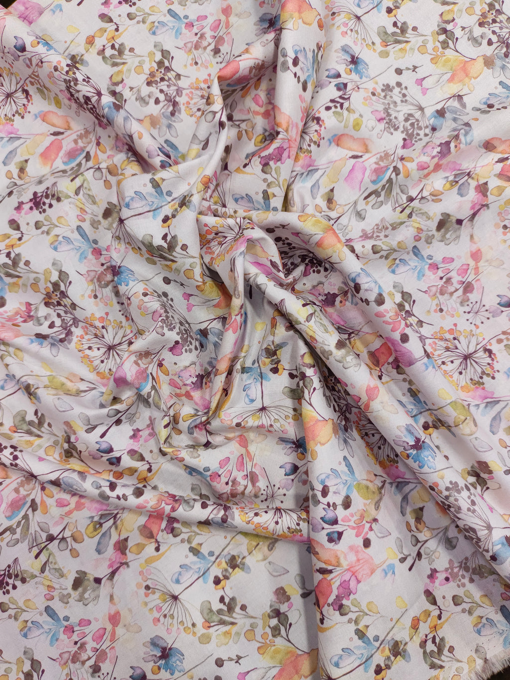 Cotton digital small all over print with pink blue and mauve.