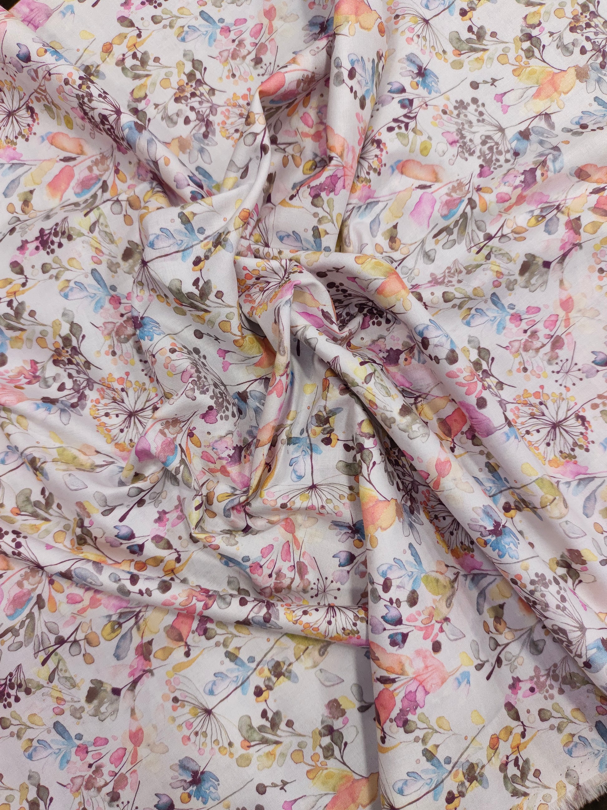 Cotton digital small all over print with pink blue and mauve.