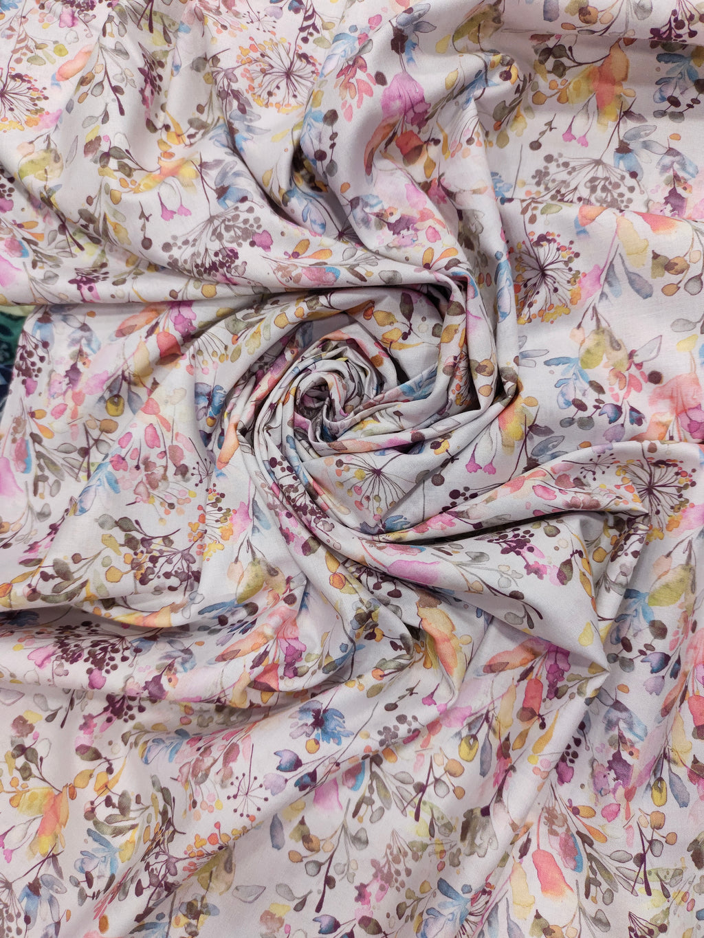 Cotton digital small all over print with pink blue and mauve.