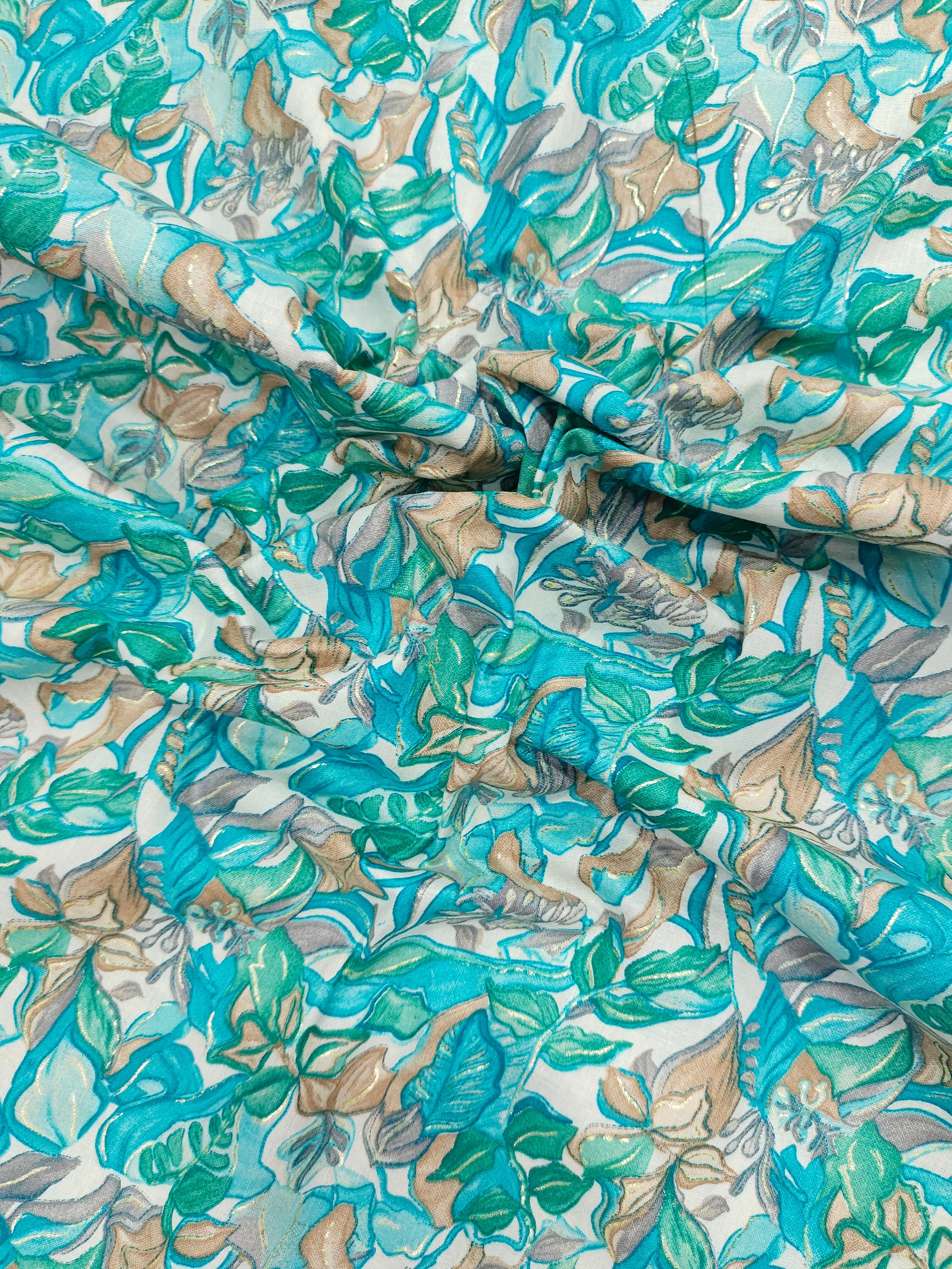 Cotton blue green mill print with gold foile.