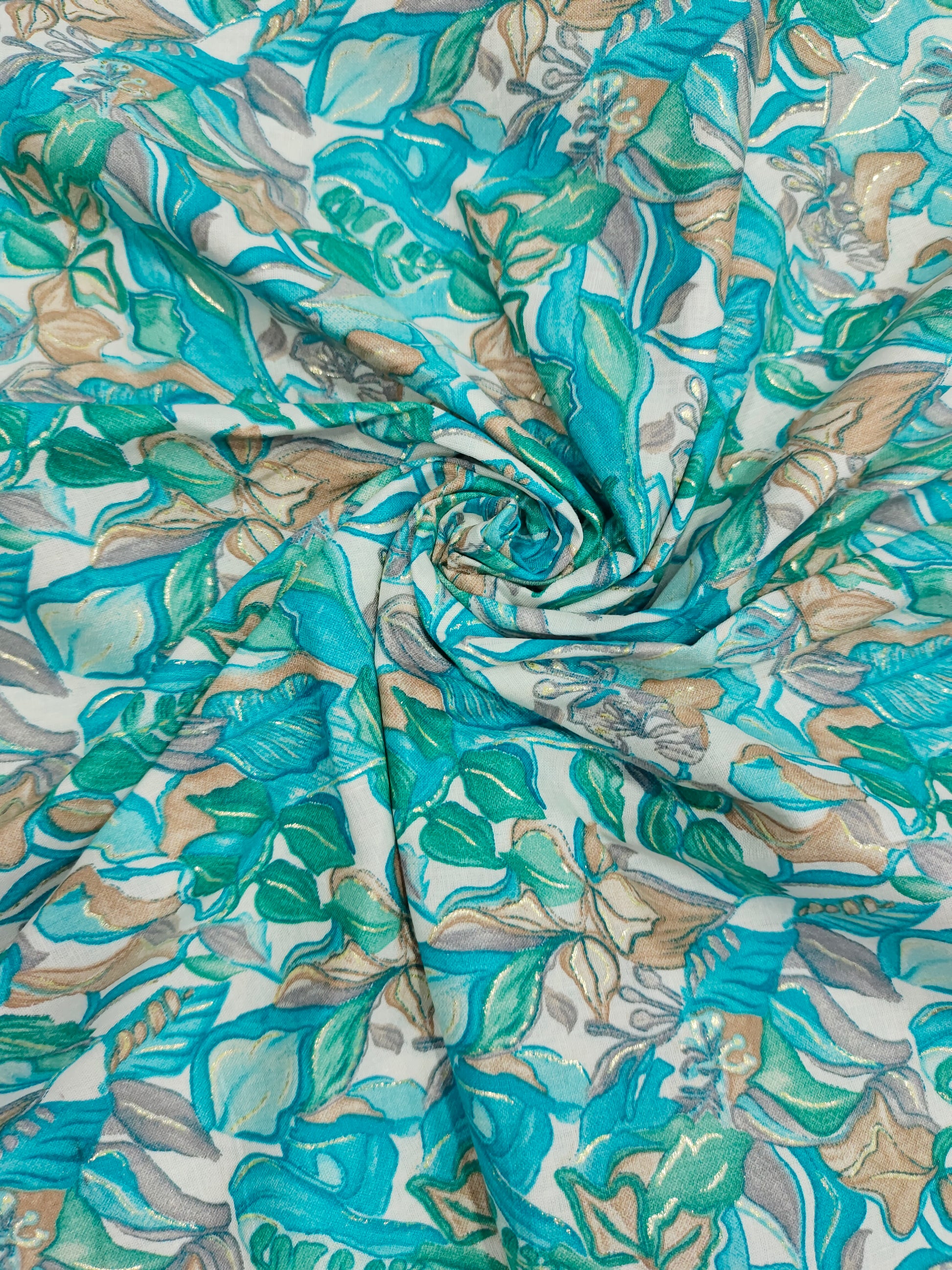 Cotton blue green mill print with gold foile.