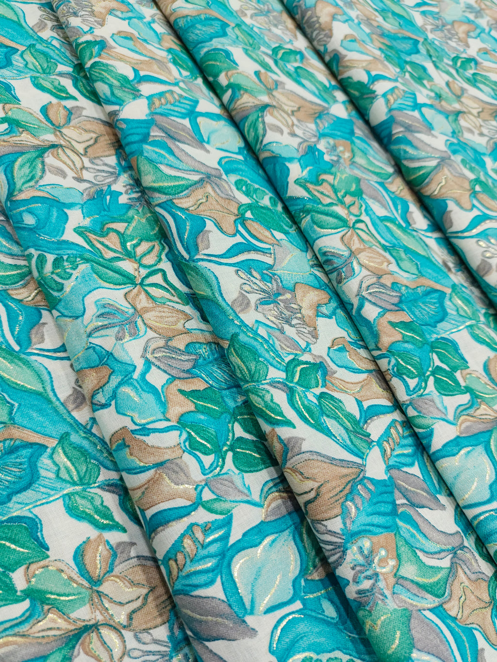 Cotton blue green mill print with gold foile.