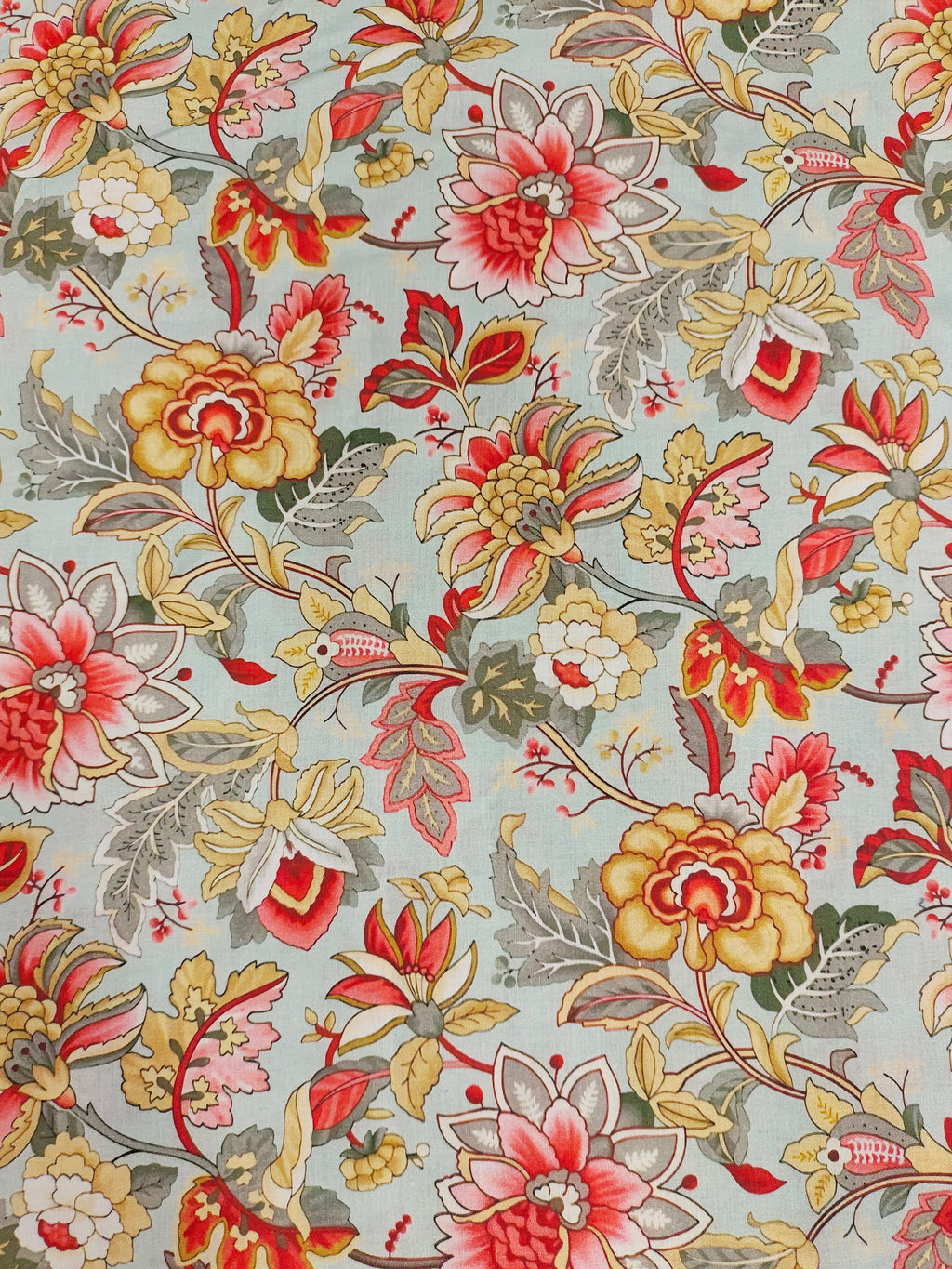 Cotton digital print with red beige and grey.