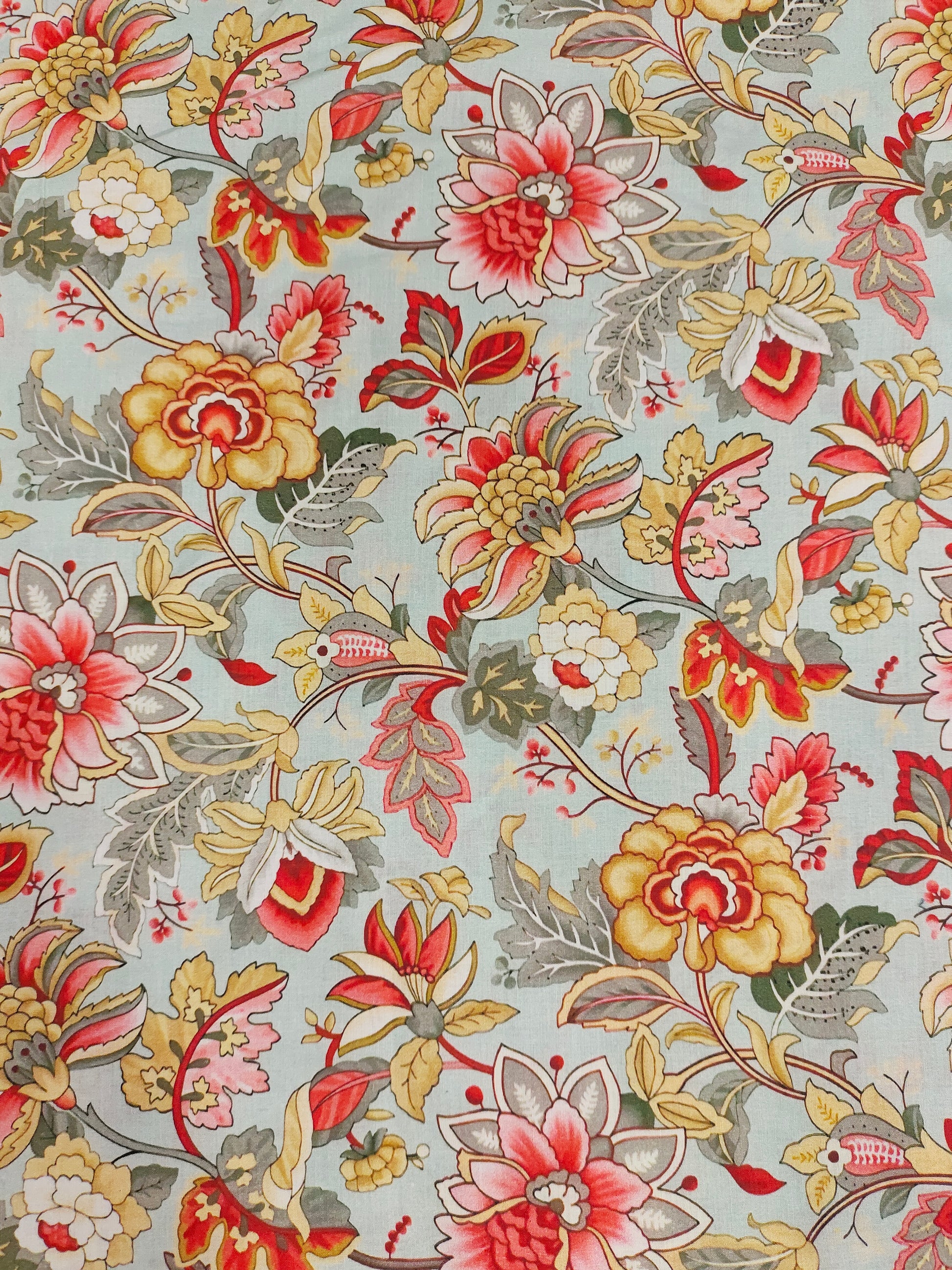 Cotton digital print with red beige and grey.