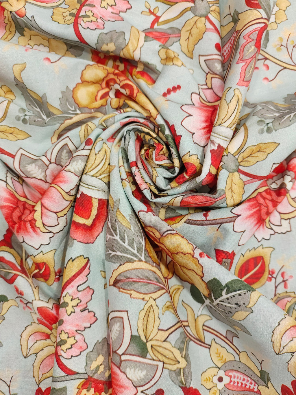 Cotton digital print with red beige and grey.