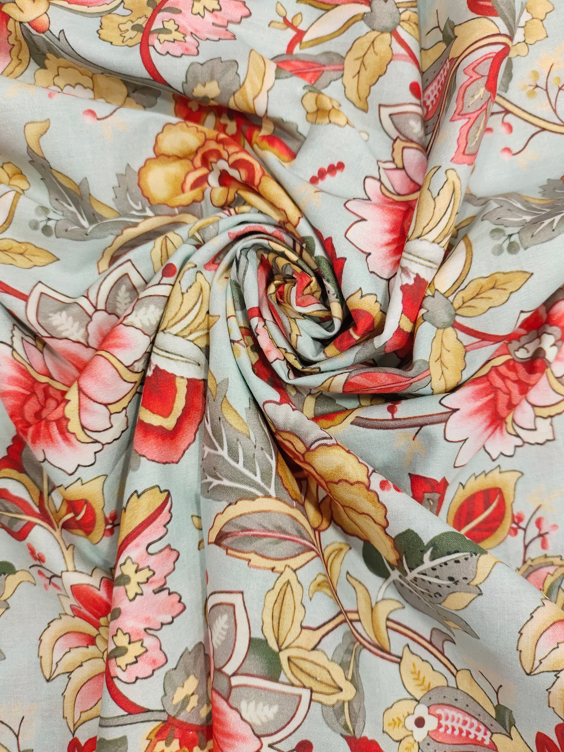 Cotton digital print with red beige and grey.