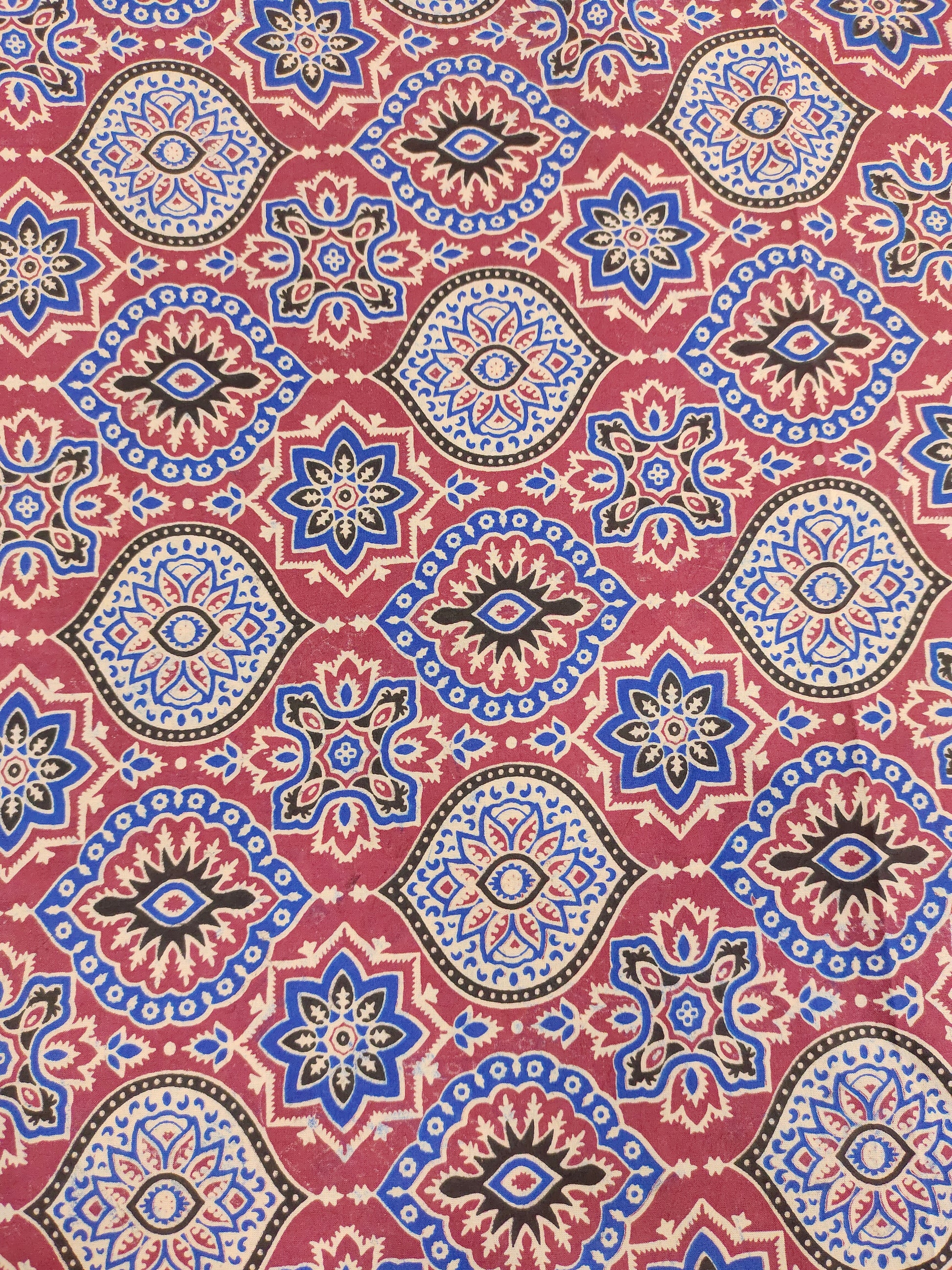 Maroon base ajrak print with blue black and beige.