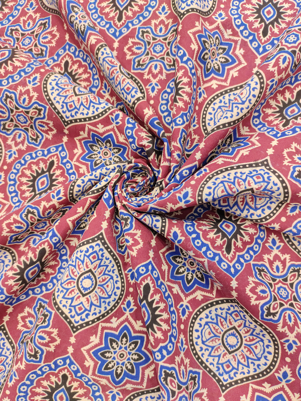 Maroon base ajrak print with blue black and beige.