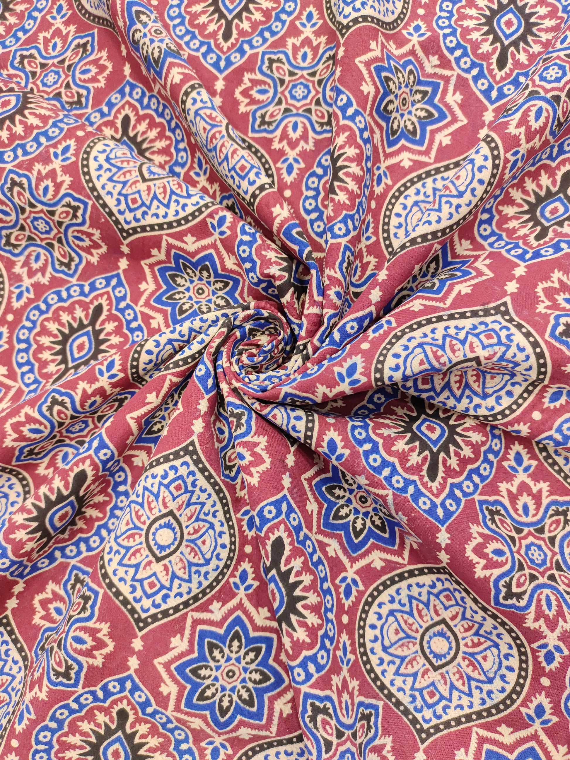 Maroon base ajrak print with blue black and beige.