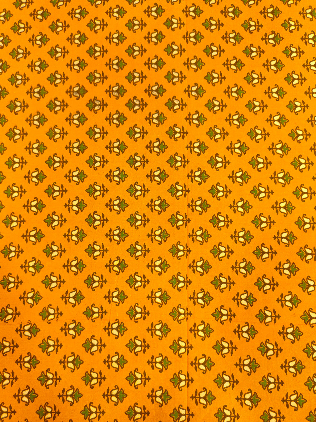 Mustard ajrak print with green and yellow small butti.