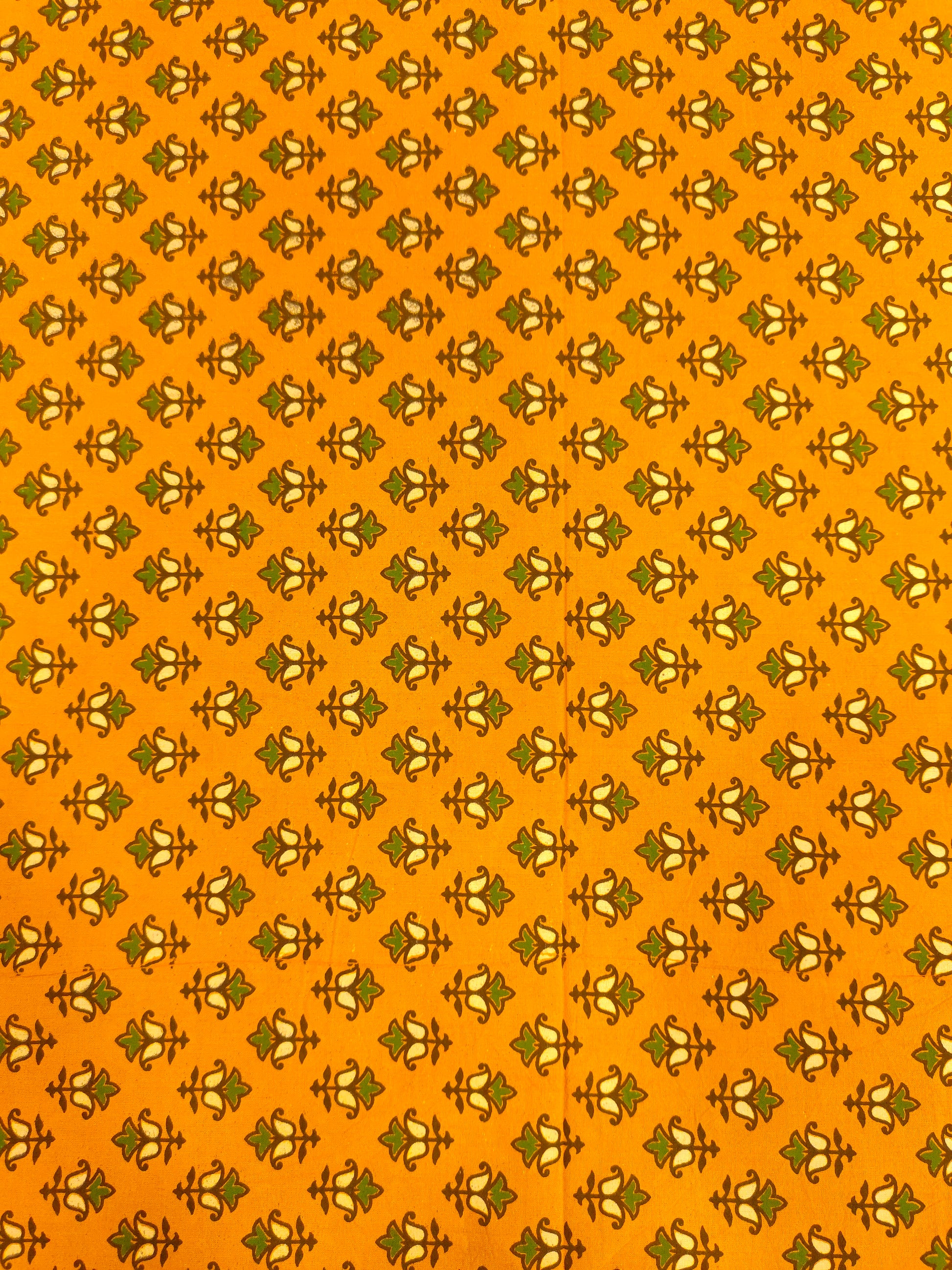 Mustard ajrak print with green and yellow small butti.