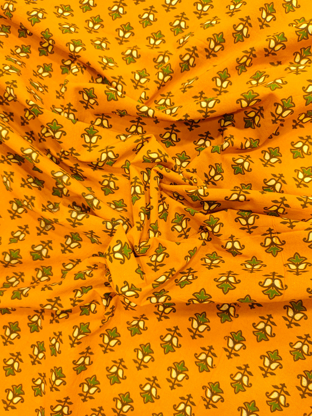 Mustard ajrak print with green and yellow small butti.