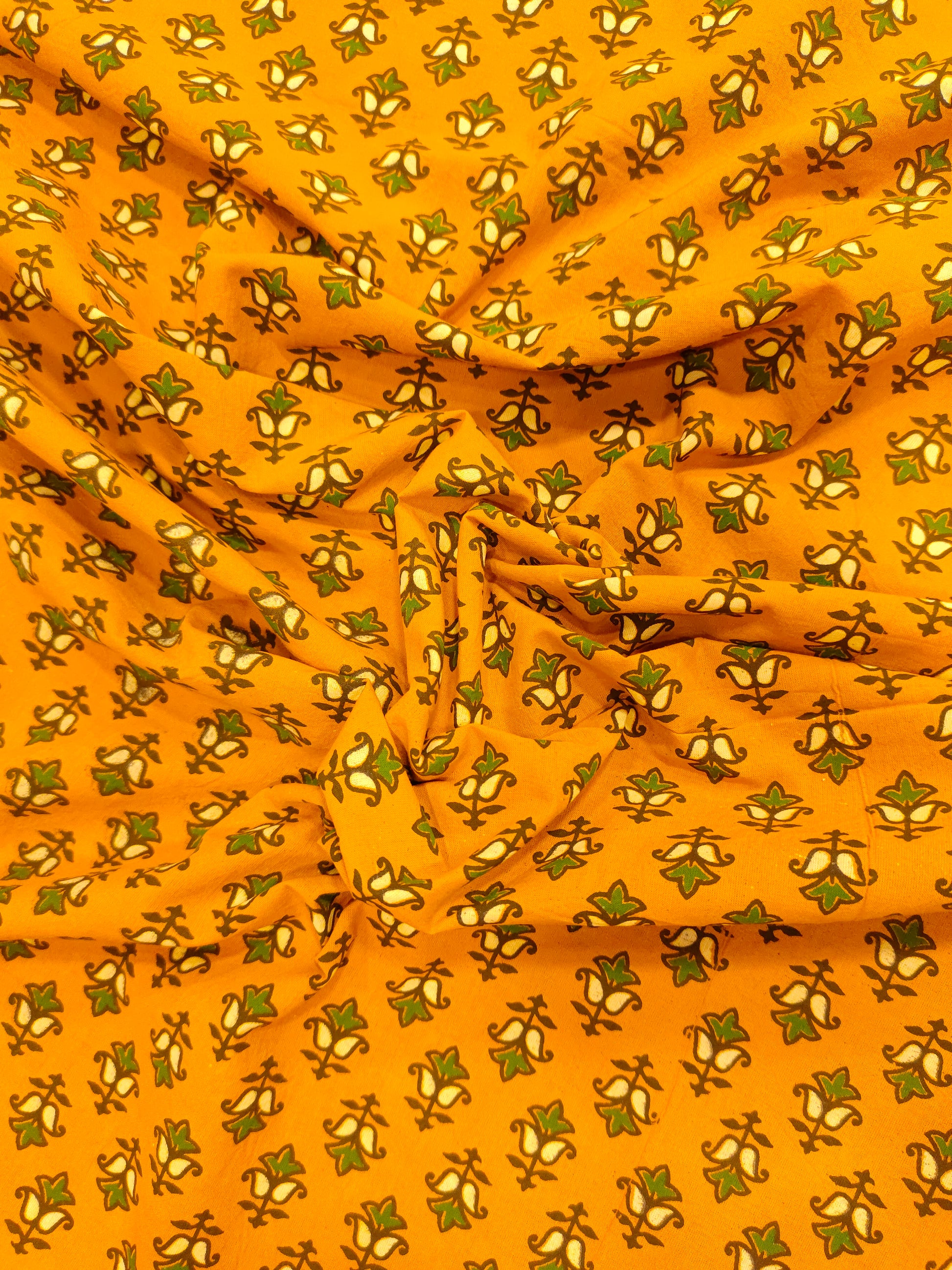 Mustard ajrak print with green and yellow small butti.