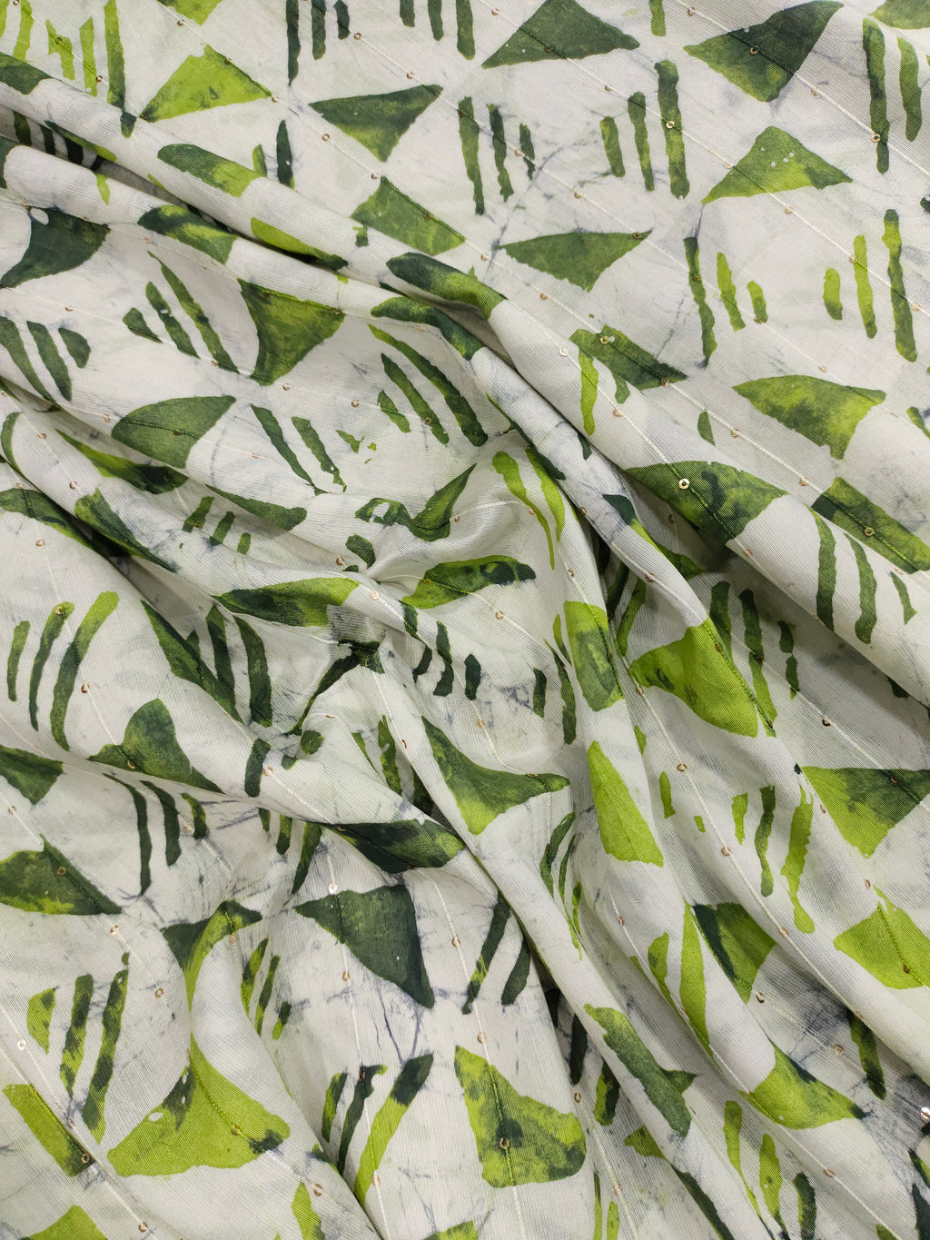 Chanderi silk batiq print with 2 shades of green and gold sequins.