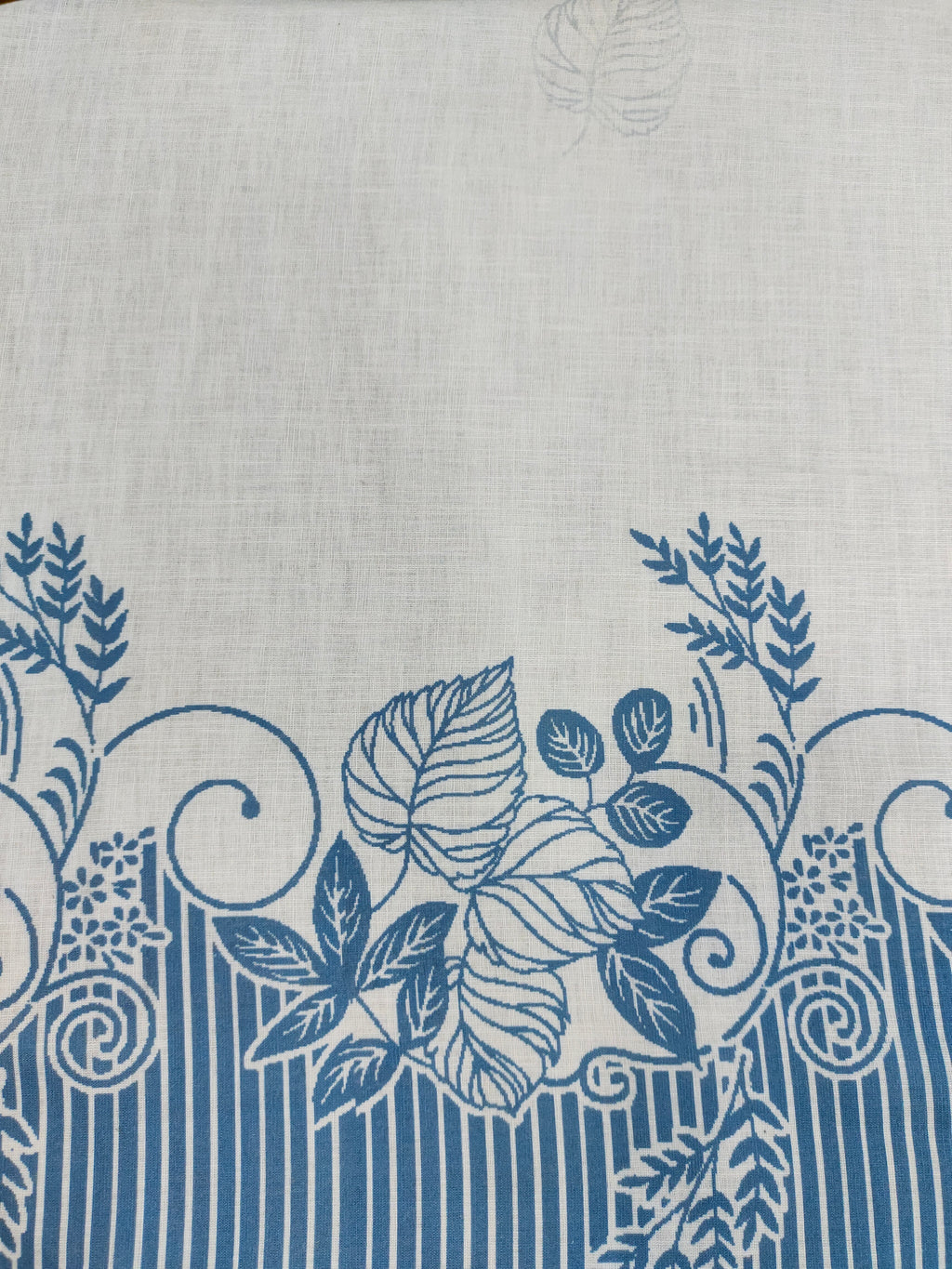 Offwhite base cotton linen fabric with blue daman print.