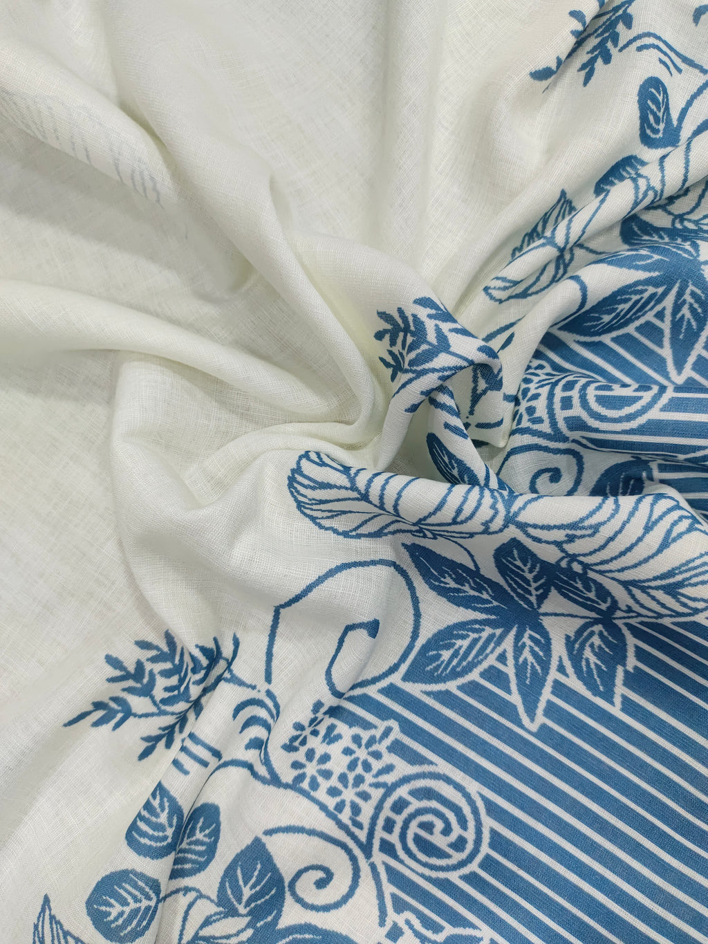 Offwhite base cotton linen fabric with blue daman print.