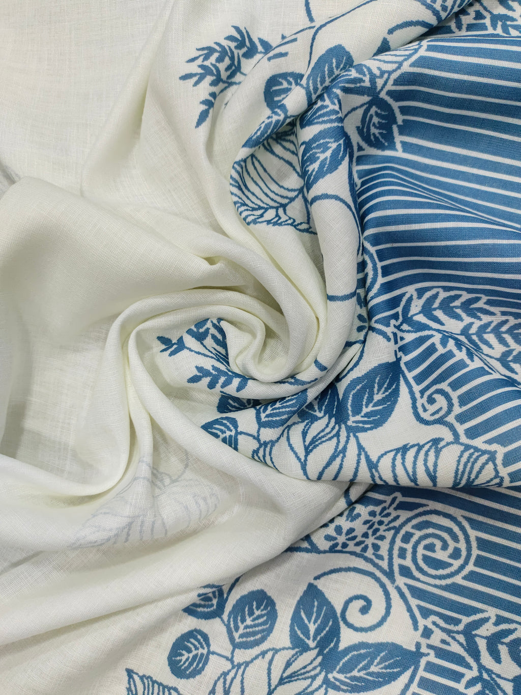 Offwhite base cotton linen fabric with blue daman print.