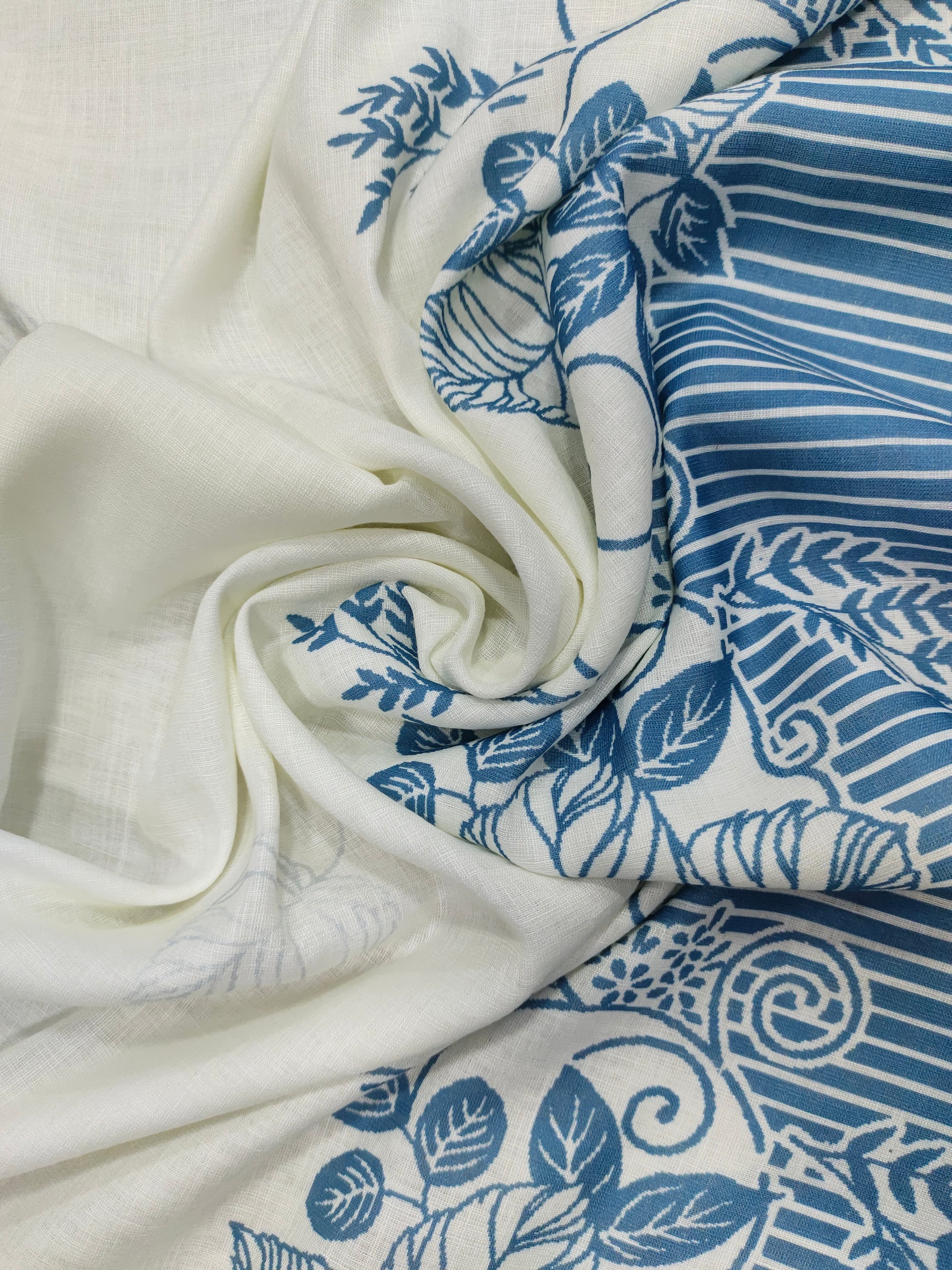 Offwhite base cotton linen fabric with blue daman print.