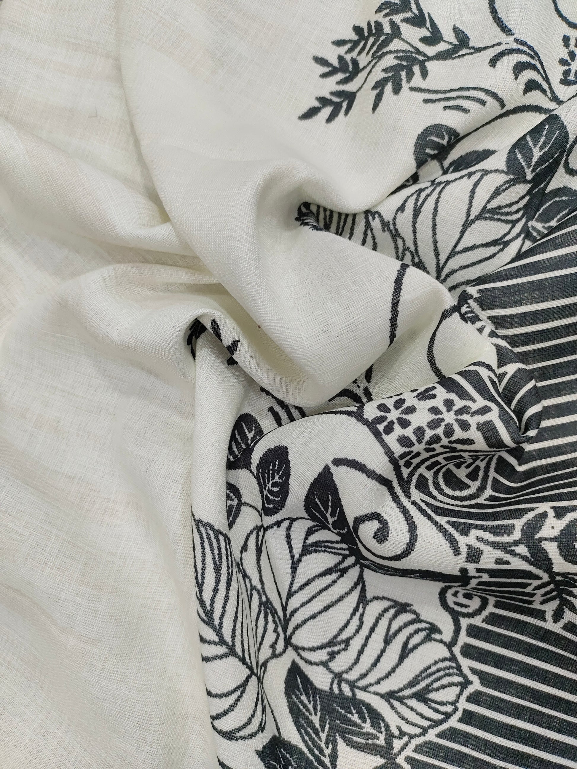 Offwhite base cotton linen fabric with black daman print.