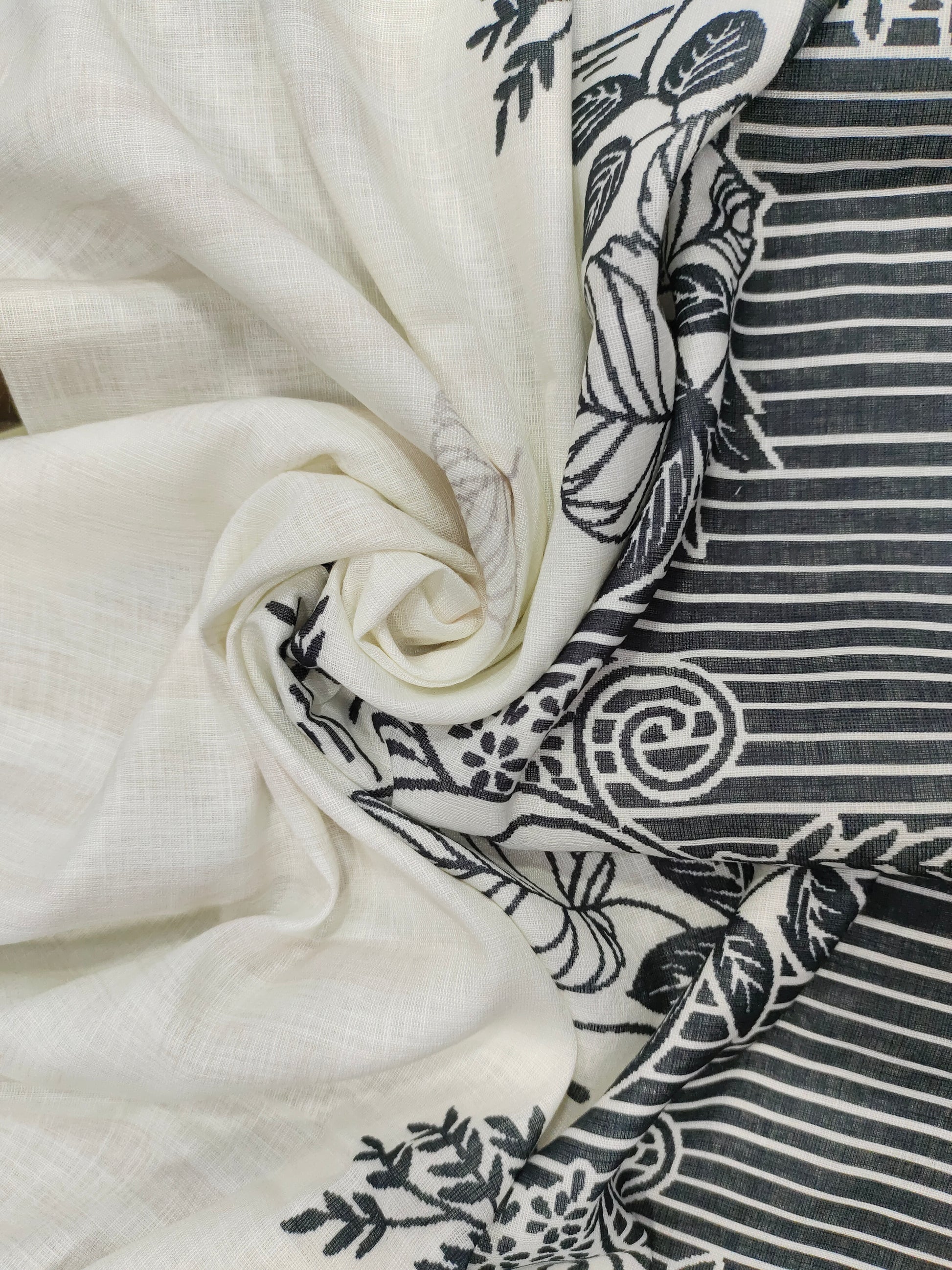 Offwhite base cotton linen fabric with black daman print.