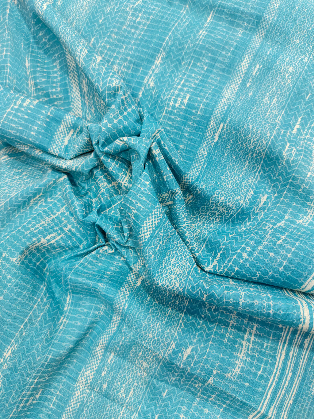 Light peacock blue screen print fabric