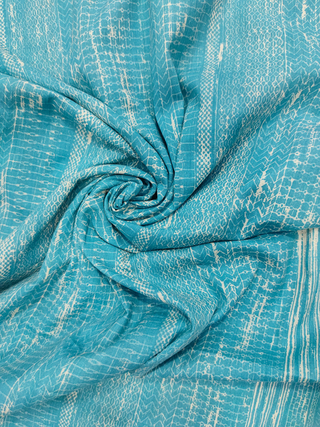 Light peacock blue screen print fabric