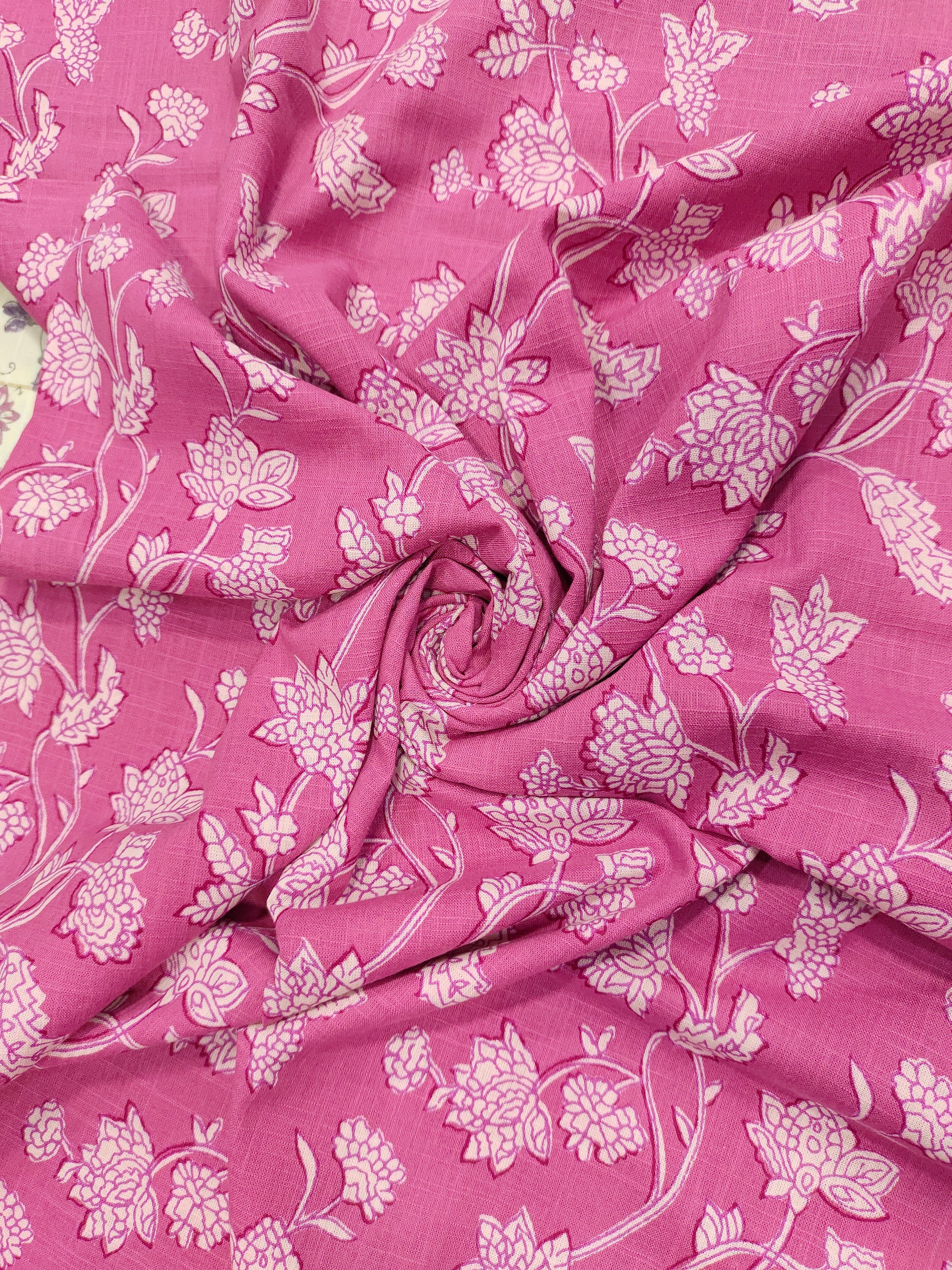Pink cotton slub printed fabric all over jaal.