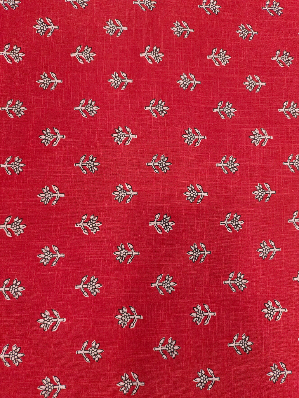 Red cotton slub small butti with black and whit.