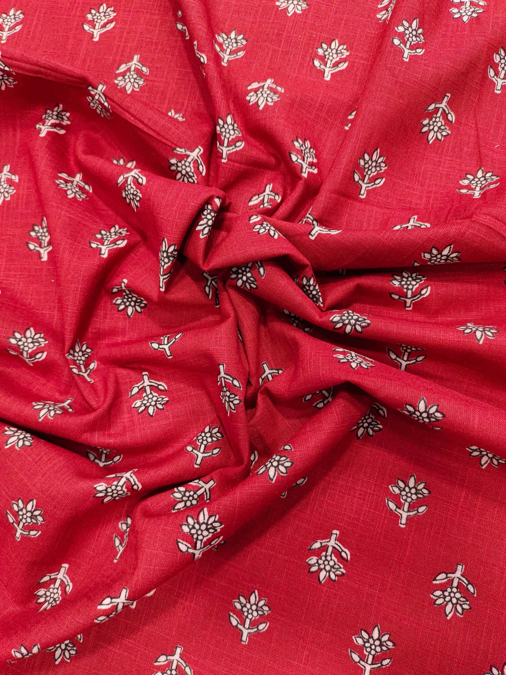 Red cotton slub small butti with black and whit.