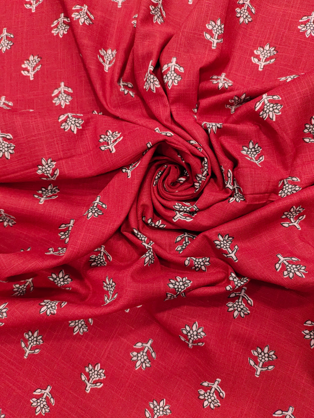 Red cotton slub small butti with black and whit.