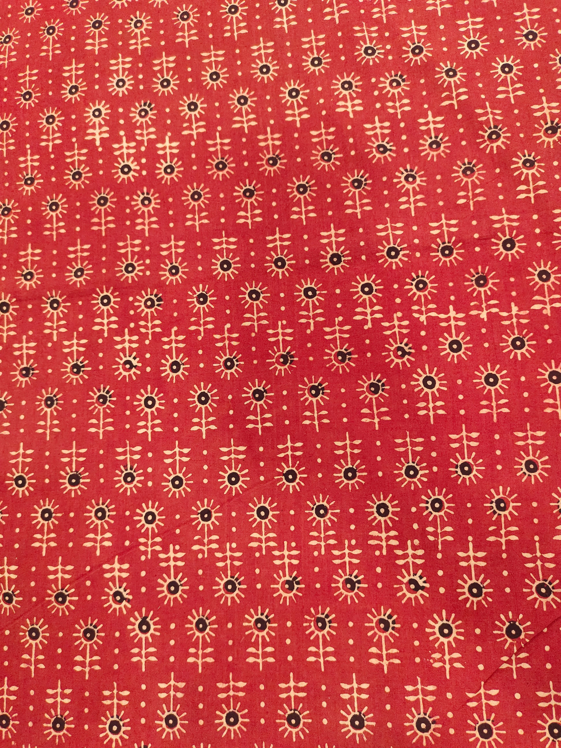 Maroon cotton ajrak print with black and beige.